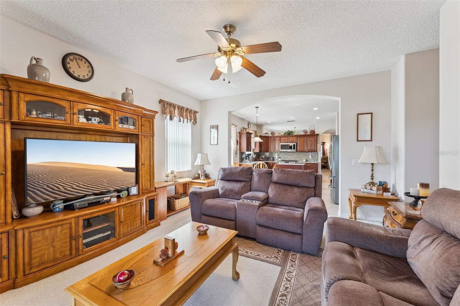 Family Room with Kitchen View - 9955 MEDALLION BLUFF LN, ORLANDO