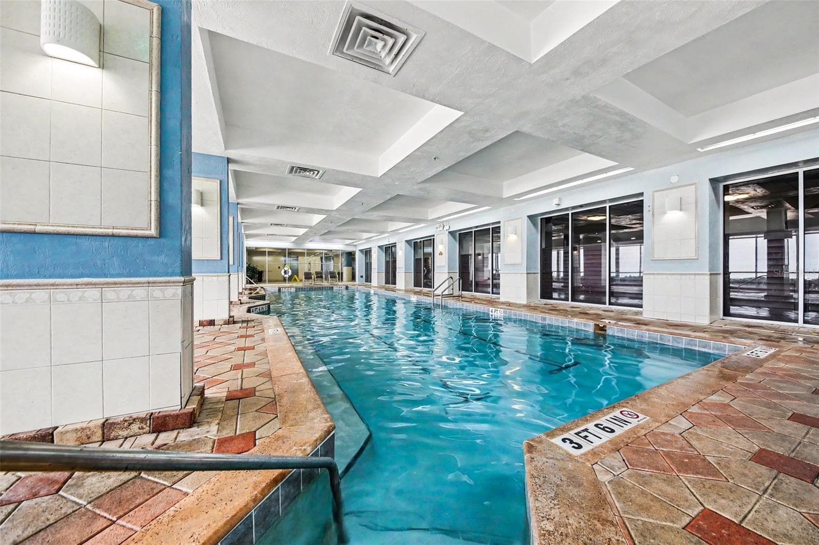 inside pool with two Spa - 2700 N ATLANTIC AVE #214, DAYTONA BEACH