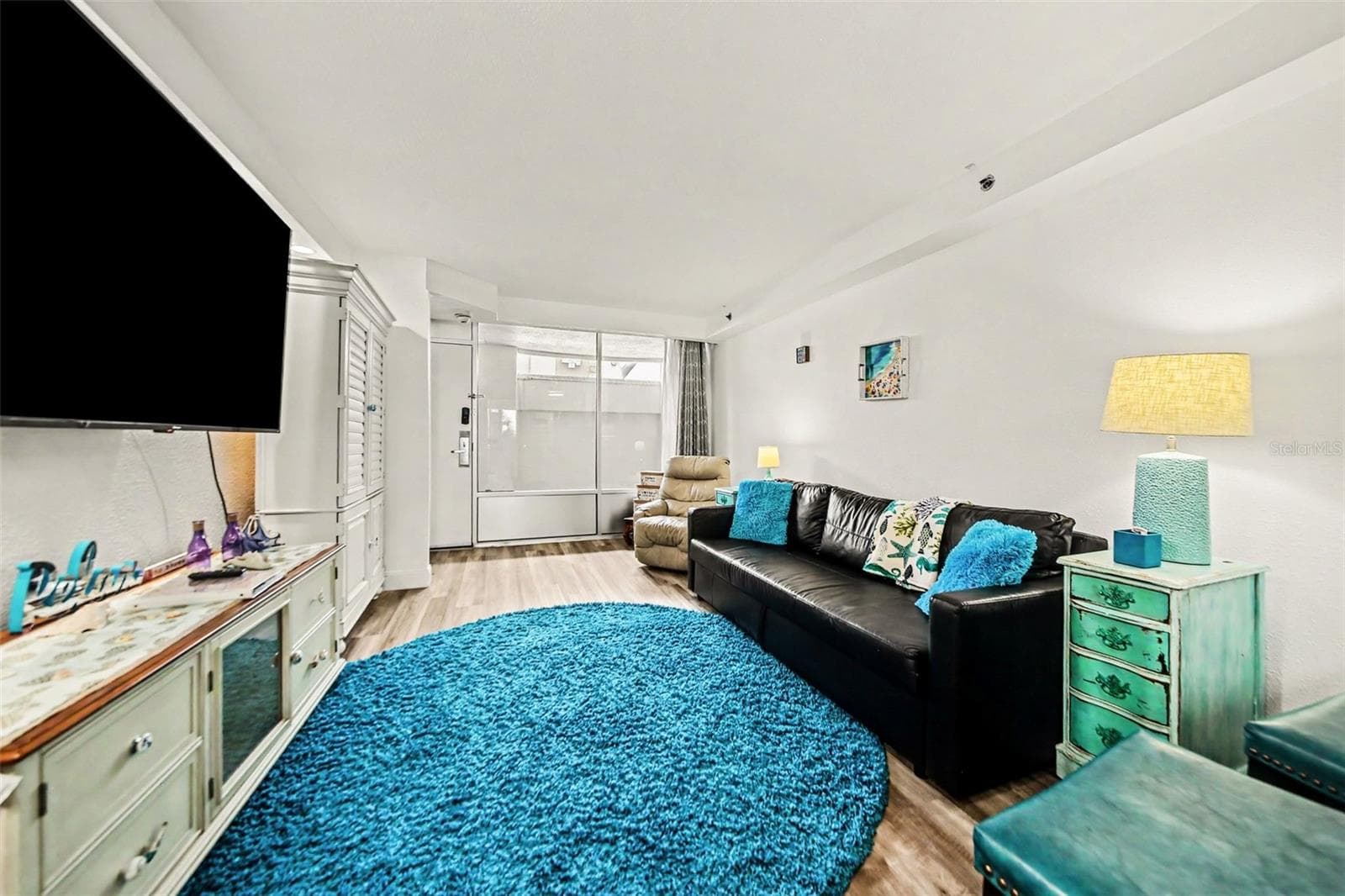 living room convertible couch - 2700 N ATLANTIC AVE #214, DAYTONA BEACH