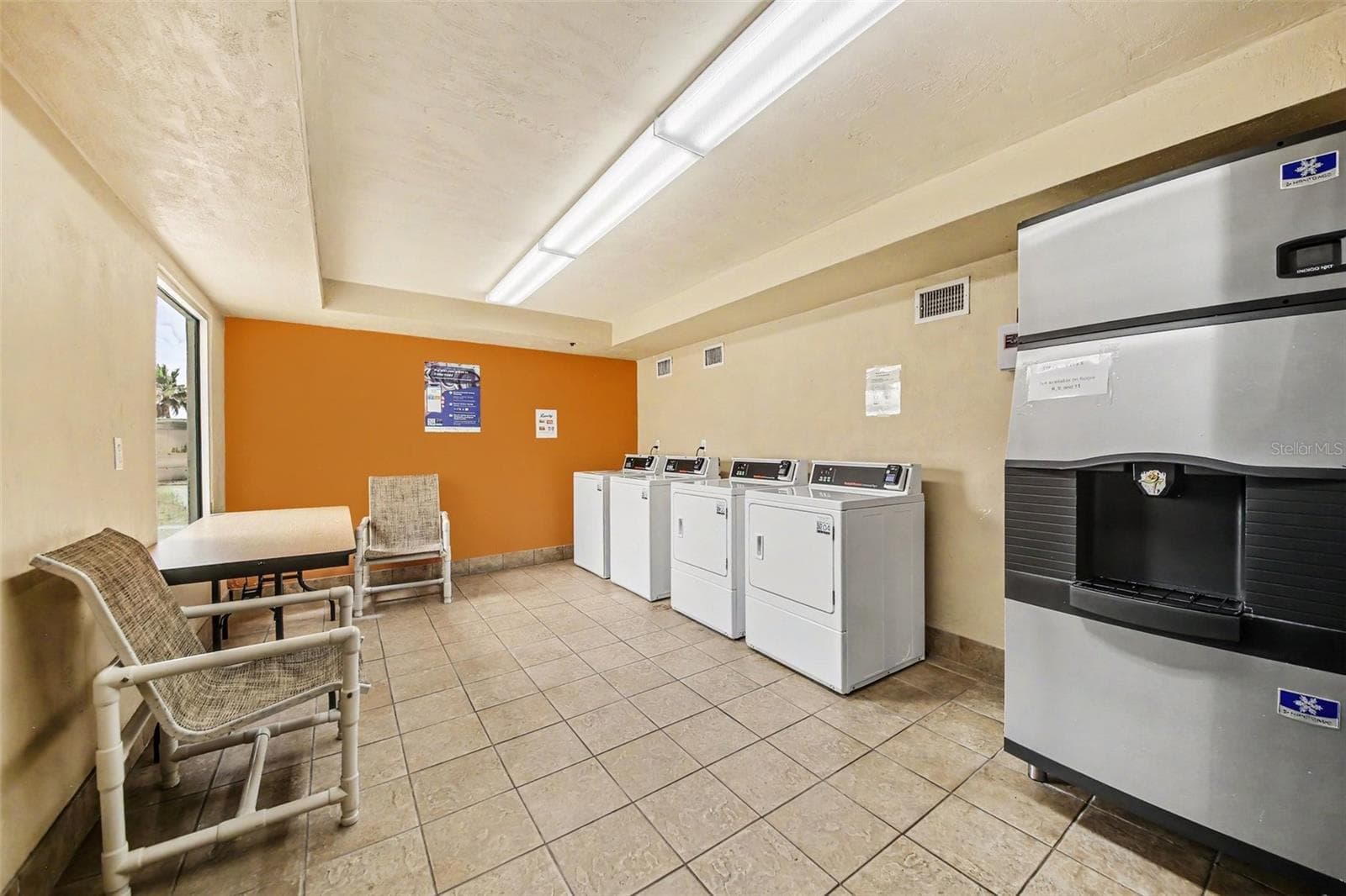 one of the laundry areas - 2700 N ATLANTIC AVE #214, DAYTONA BEACH
