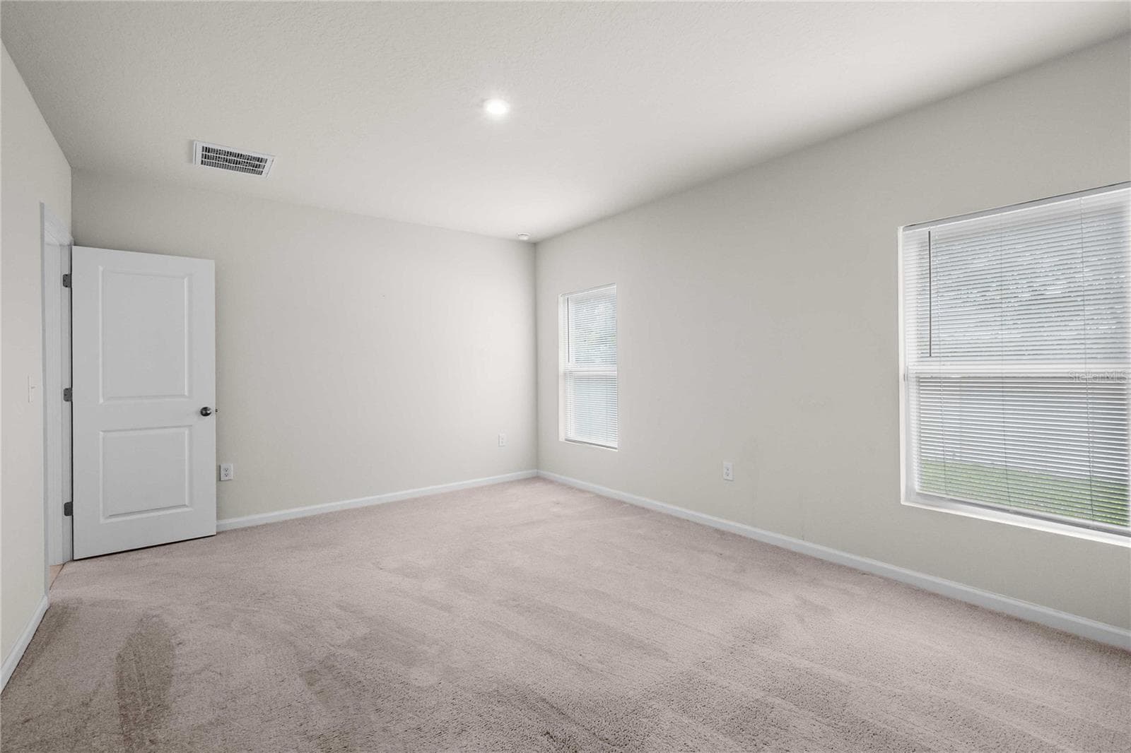 This room can easily fit a king size bed - 35155 JOMAR AVE, ZEPHYRHILLS
