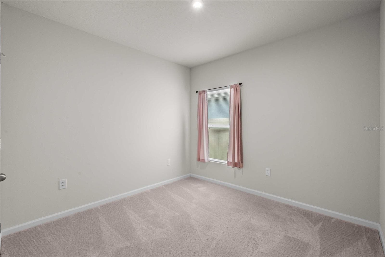 Both bedrooms are split away from the primary bedroom offering privacy - 35155 JOMAR AVE, ZEPHYRHILLS