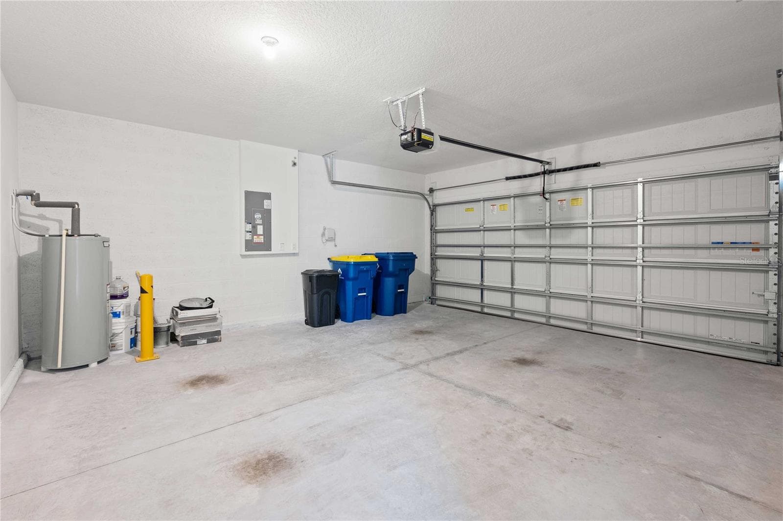 The garage is 18 x 19 and has an EV charger! - 35155 JOMAR AVE, ZEPHYRHILLS