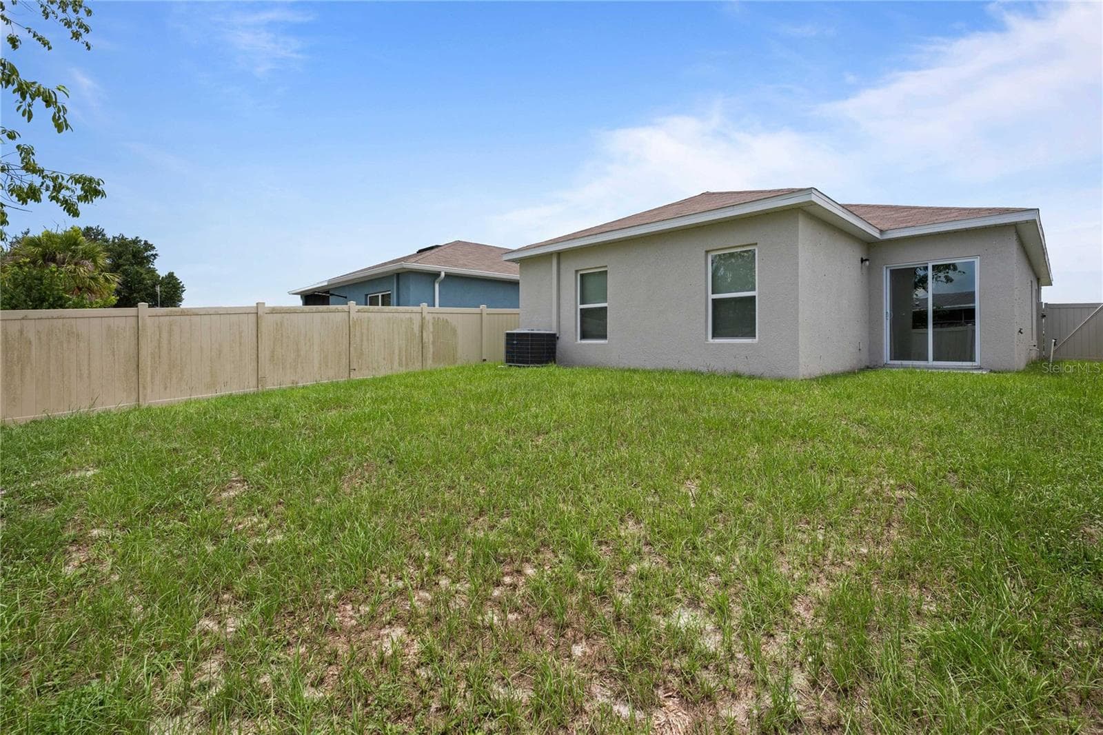 You will also love the backyard - 35155 JOMAR AVE, ZEPHYRHILLS