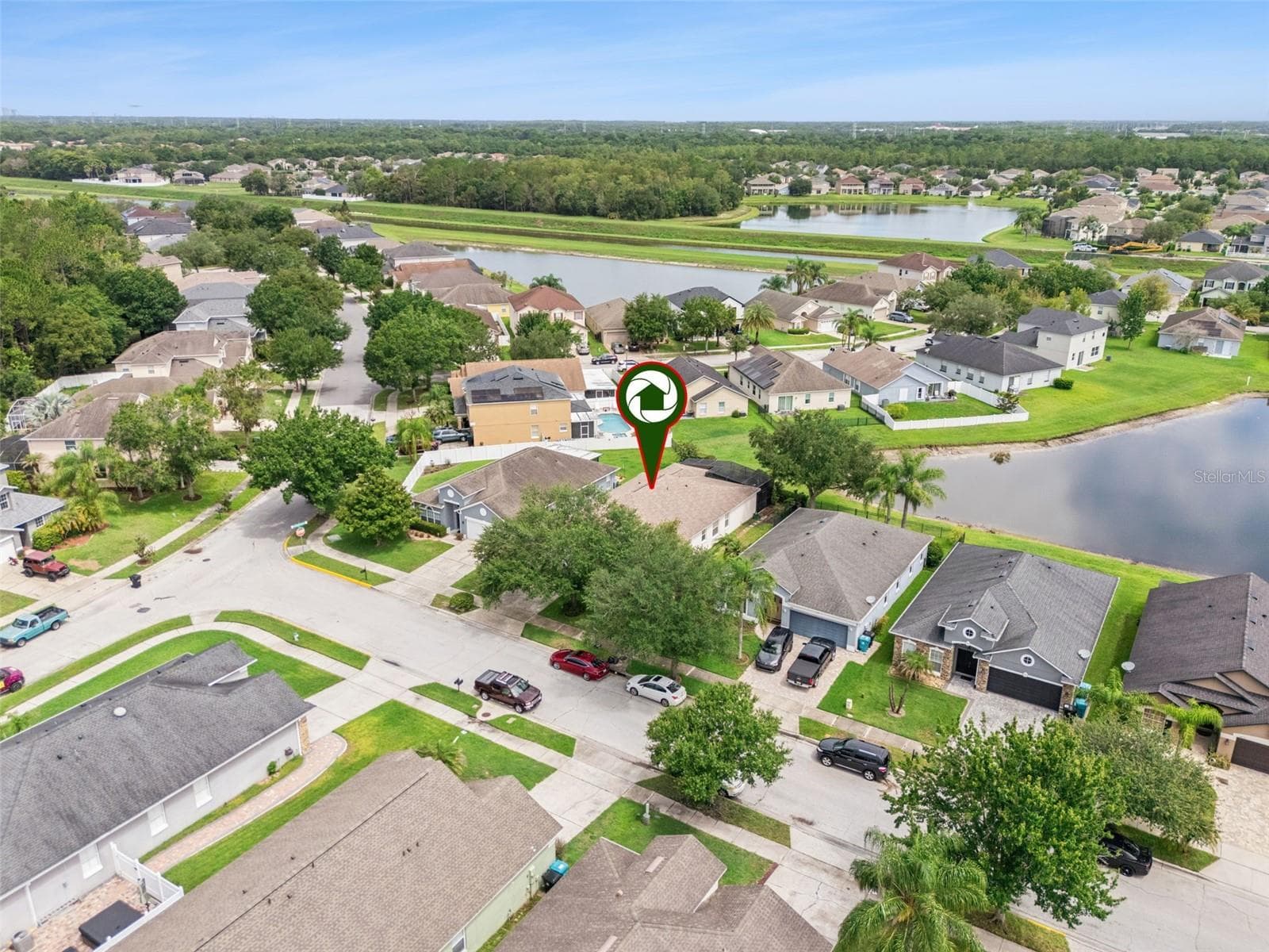 Aerial view of the home and surrounding community - 9955 MEDALLION BLUFF LN, ORLANDO