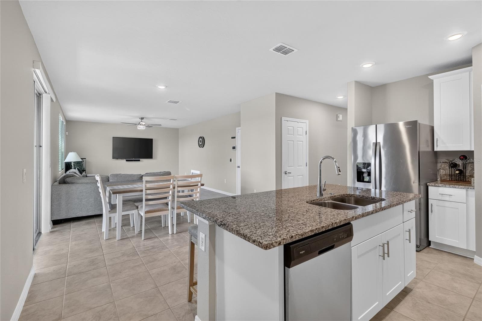 Kitchen view to dining room - 3310 WEITZEL DR, HAINES CITY