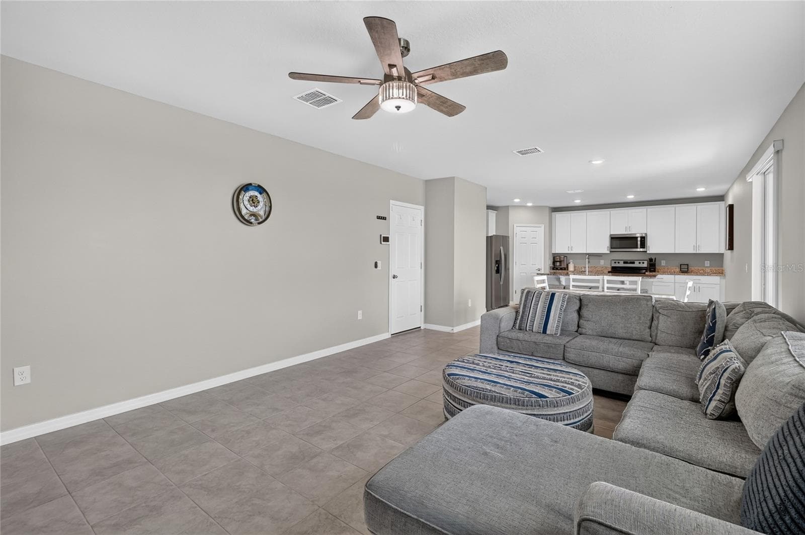 Living room door to the garage - 3310 WEITZEL DR, HAINES CITY