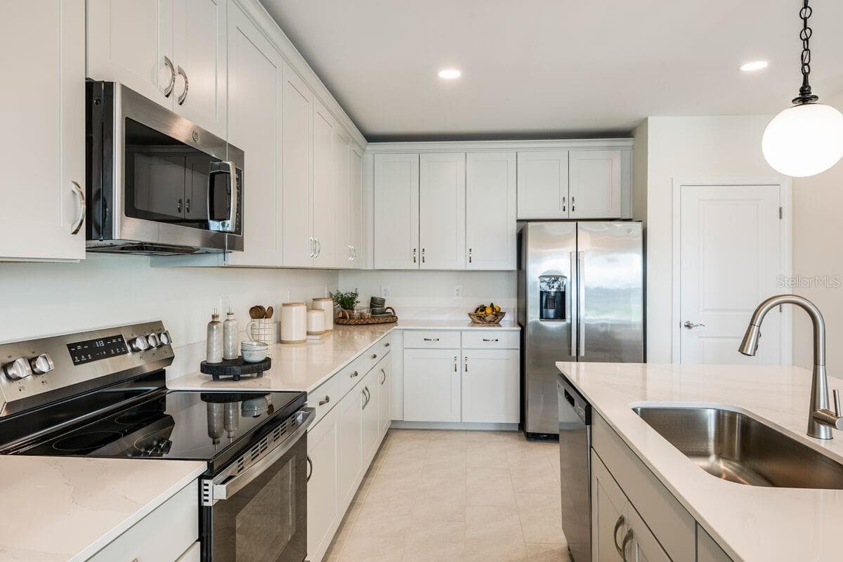 Kitchen-Pictures are of Model Home for representational purposes only. - 13688 LOREDO WAY, PUNTA GORDA