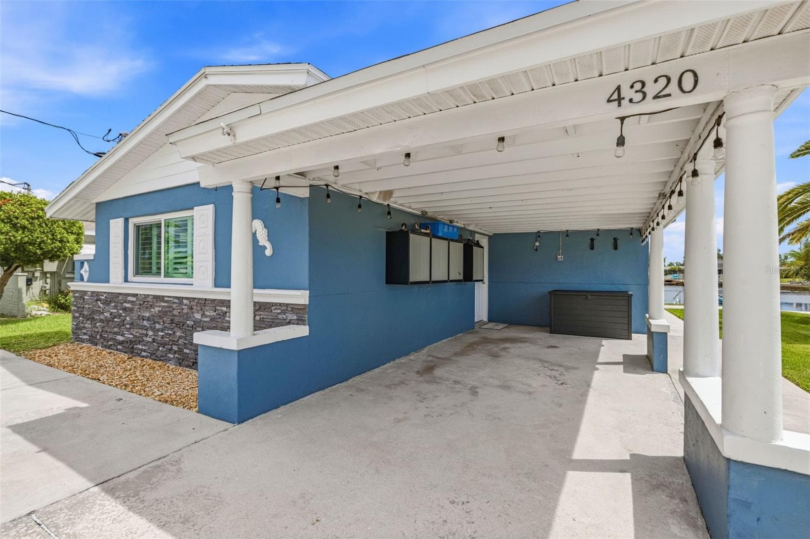 Keyless entry doors and storage under the carport. - 4320 FLORAMAR TER, NEW PORT RICHEY