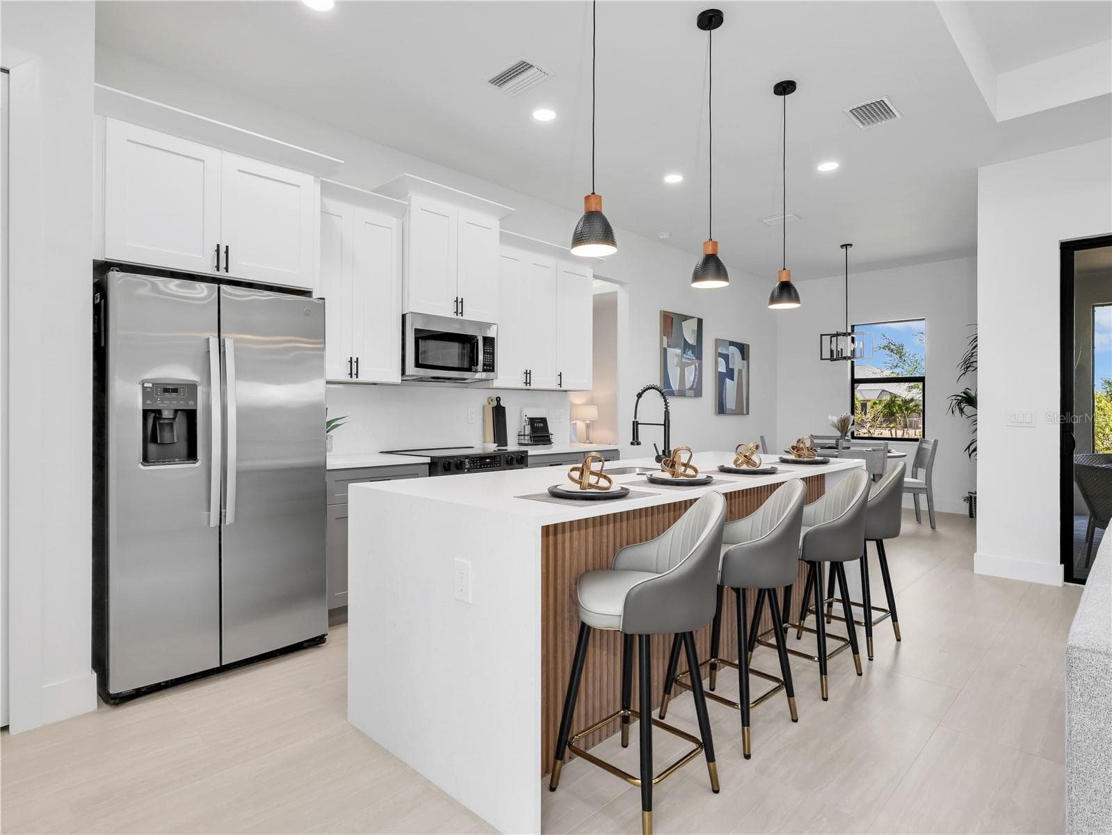 Kitchen picture taken from another model home - 1015 NW 23RD AVE, CAPE CORAL