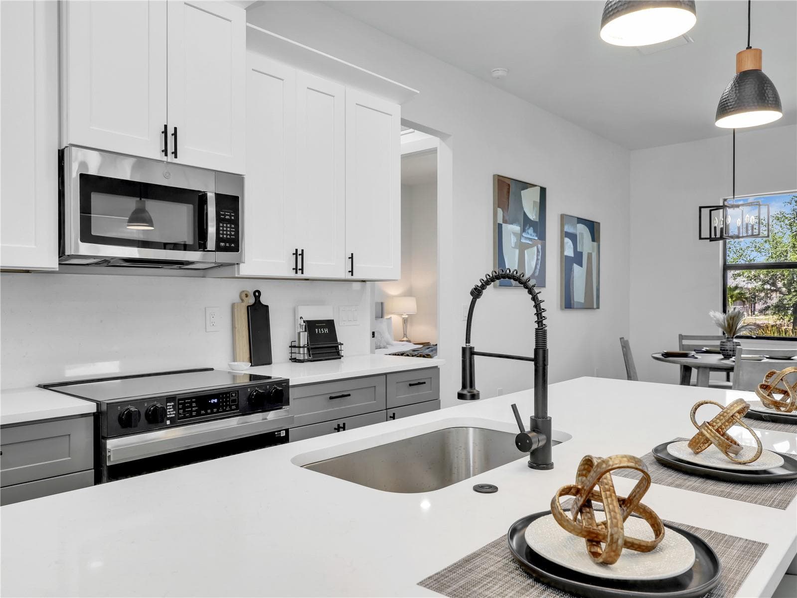Kitchen picture taken from another model home - 1015 NW 23RD AVE, CAPE CORAL