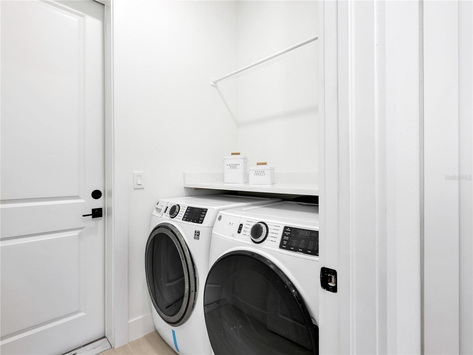 Laundry Room picture taken from another model home - 1015 NW 23RD AVE, CAPE CORAL