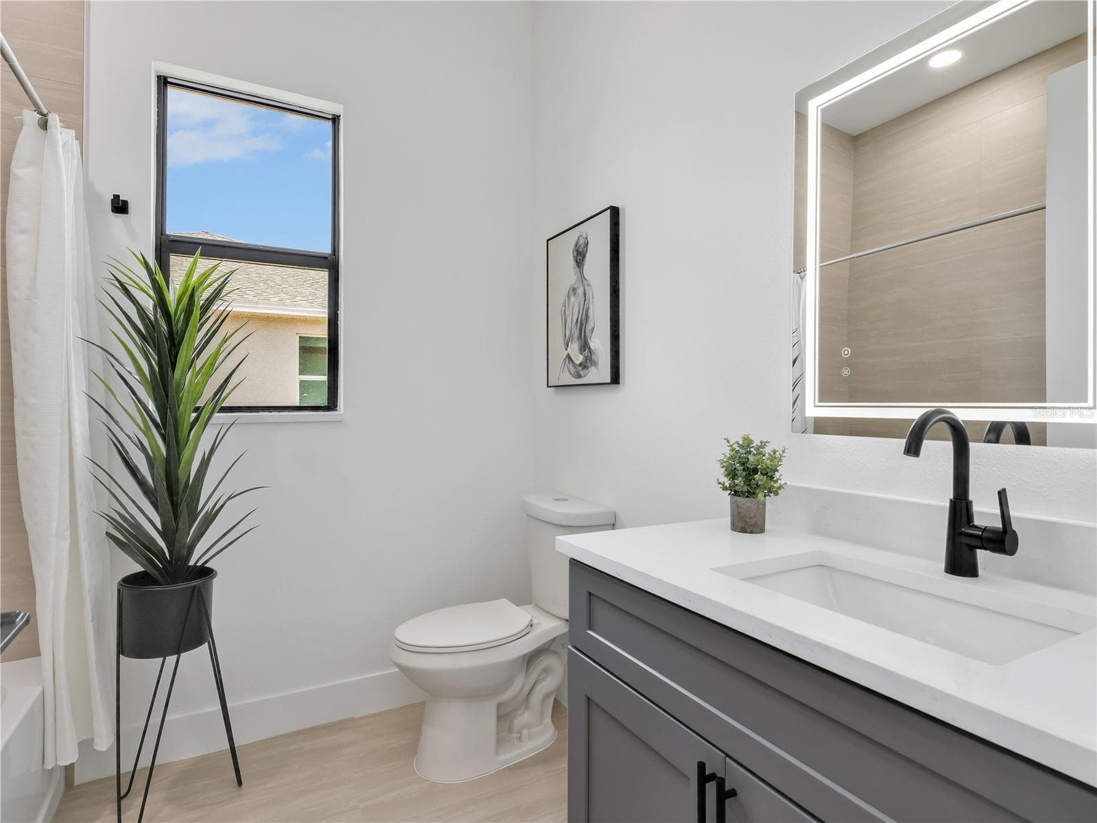 Guest Bathroom picture taken from another model home - 1015 NW 23RD AVE, CAPE CORAL