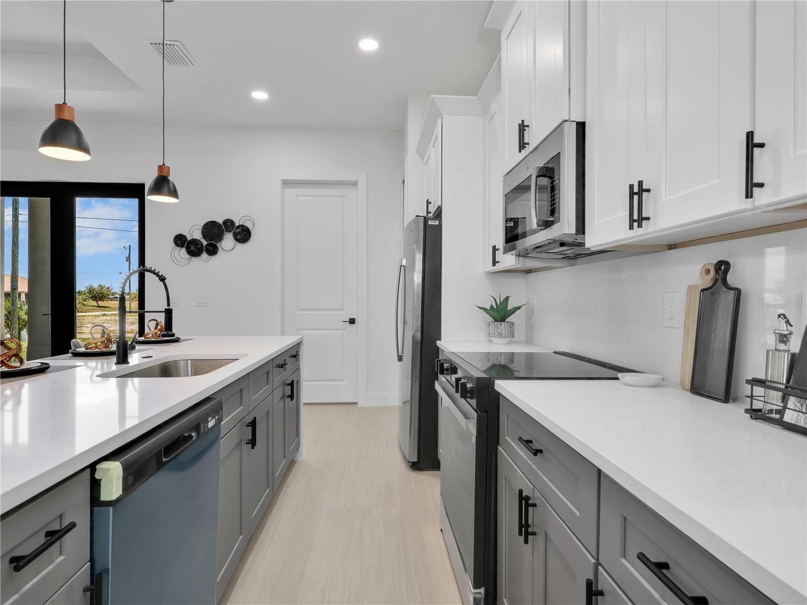 Kitchen picture taken from another model home - 1704 NW 6TH PL, CAPE CORAL