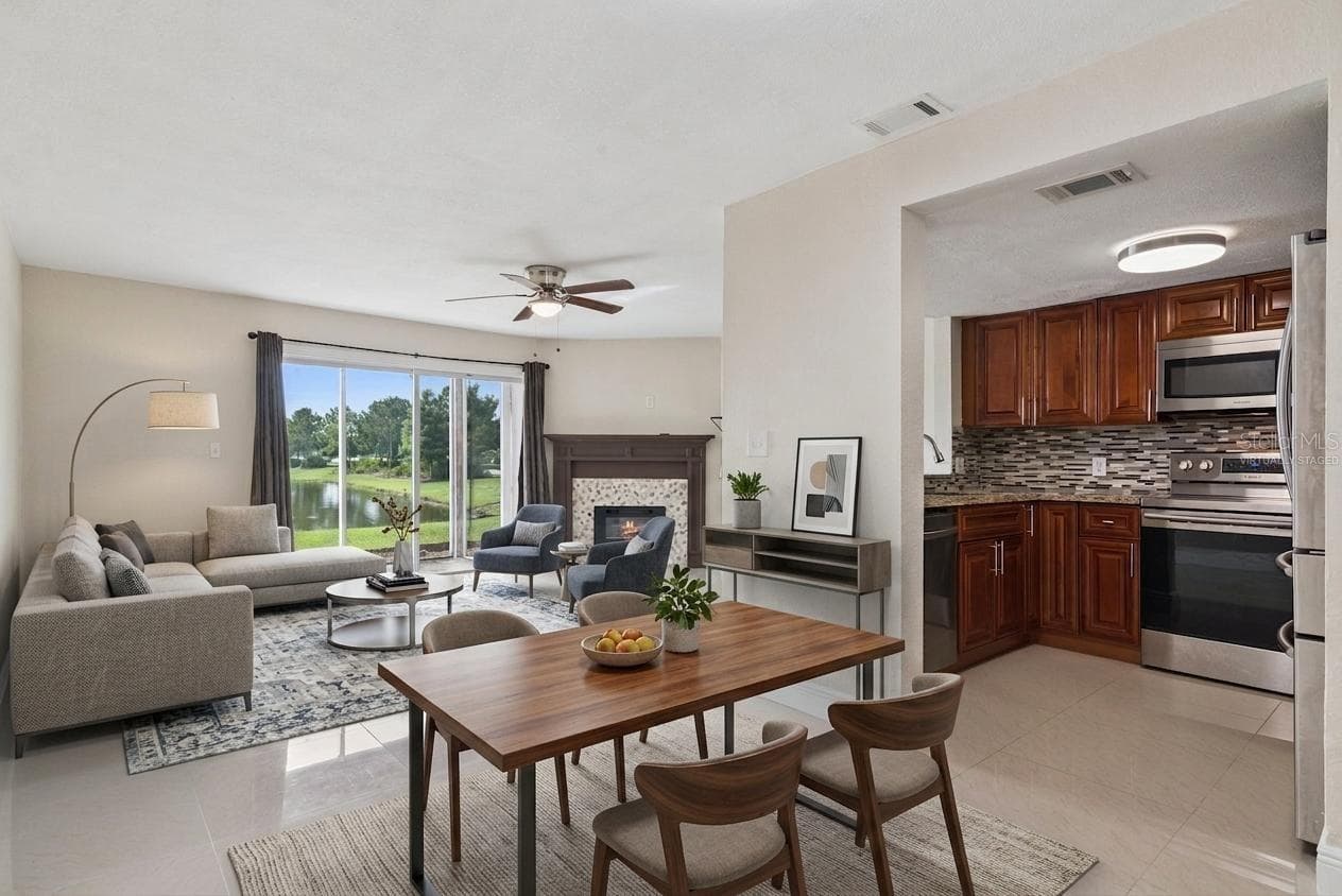 Dining Room/Living Room Combo - Virtually Staged - 214 MAJORS LN #C, KISSIMMEE