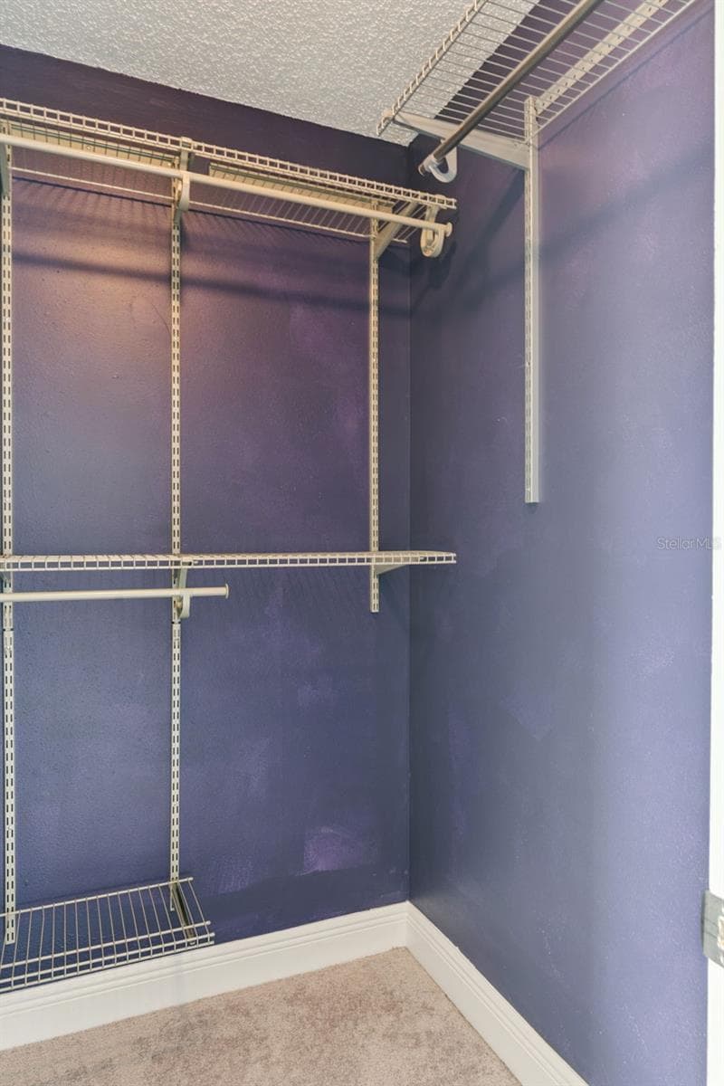 Primary Bedroom Walk-In Closet - 214 MAJORS LN #C, KISSIMMEE