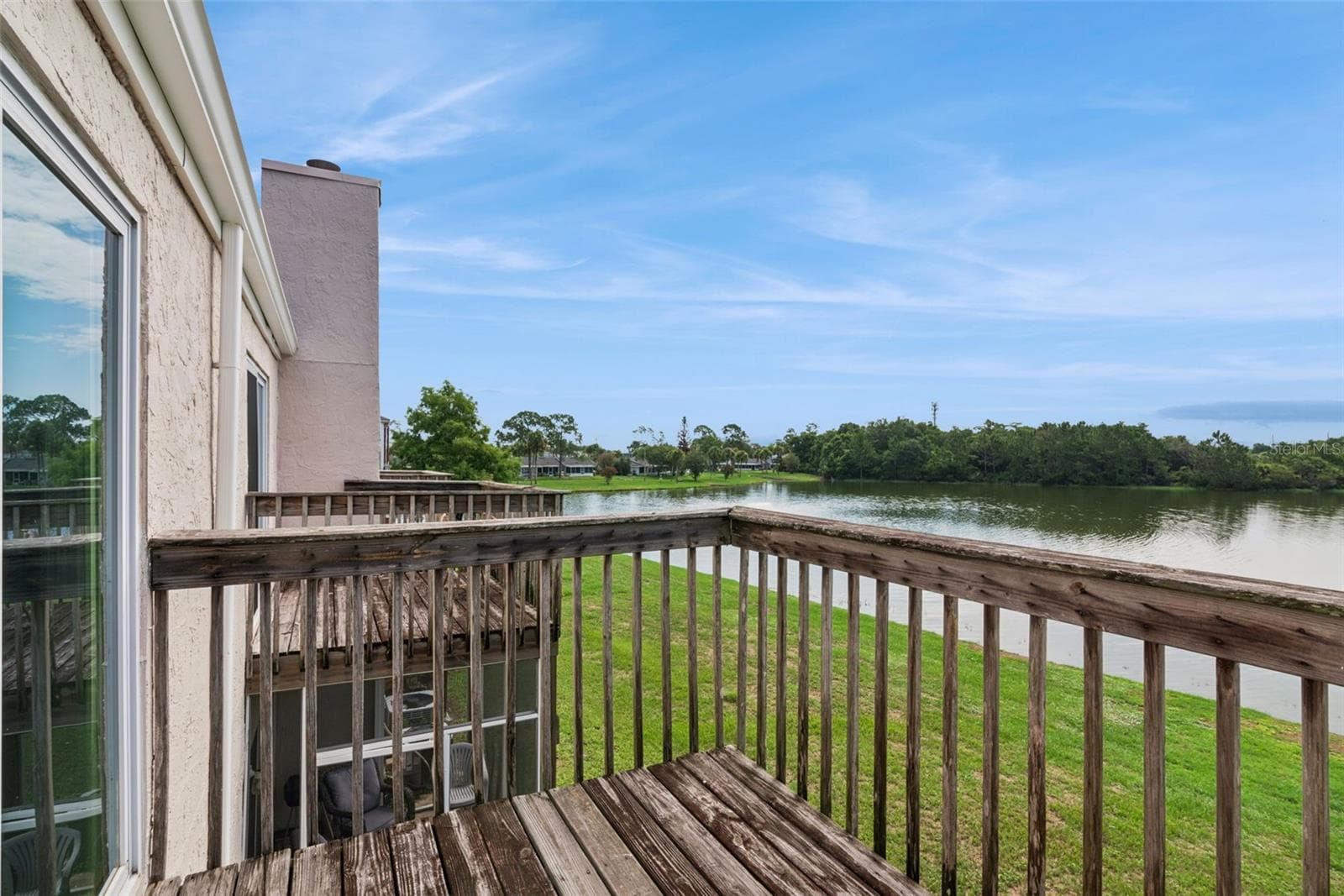 Second Floor Patio with view to the pond - 214 MAJORS LN #C, KISSIMMEE