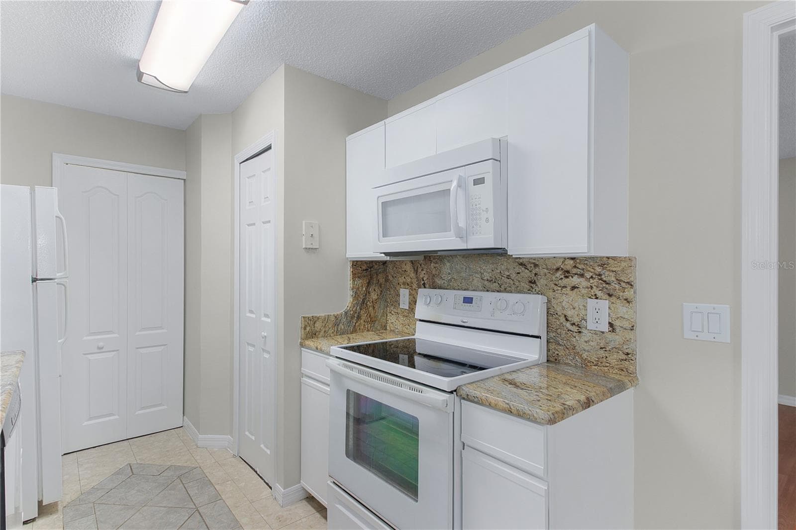 Laundry Closet at the end of kitchen - 605 YOUNGSTOWN PKWY #30, ALTAMONTE SPRINGS