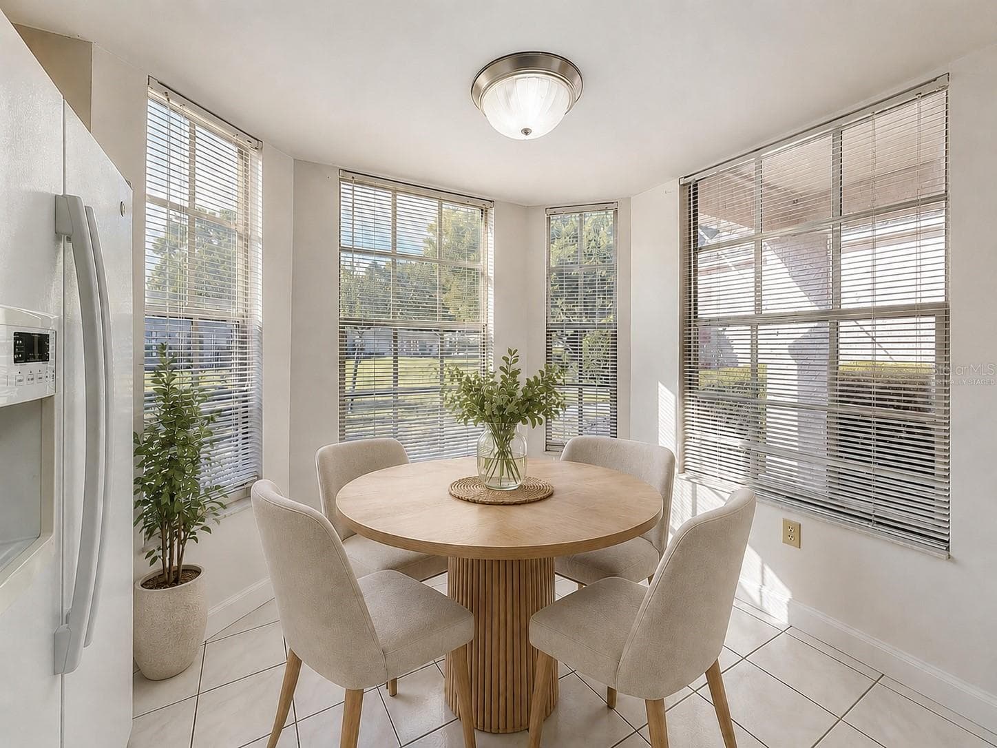 Virtually Staged Breakfast Nook - 11403 VERSAILLES LN #E, PORT RICHEY
