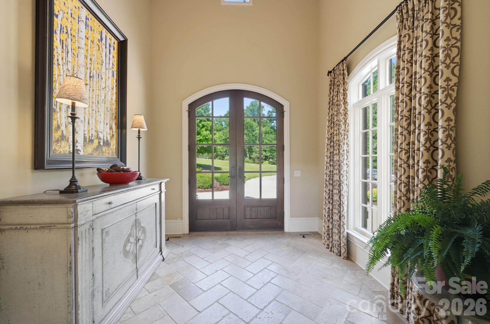 Designed by Jim Phelps and built by Arcadia Homes, Foyer w/cathedral tongue & groove ceiling - 8528 Waxhaw Creek Road, Waxhaw