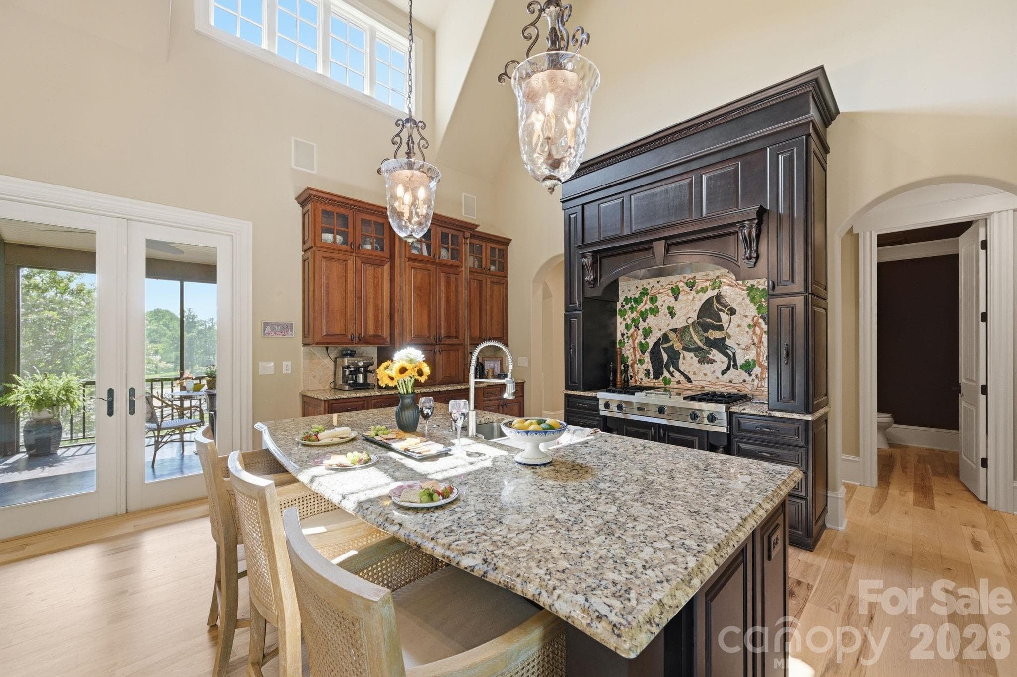 Viking gas cooktop with mosaic tile backsplash - 8528 Waxhaw Creek Road, Waxhaw