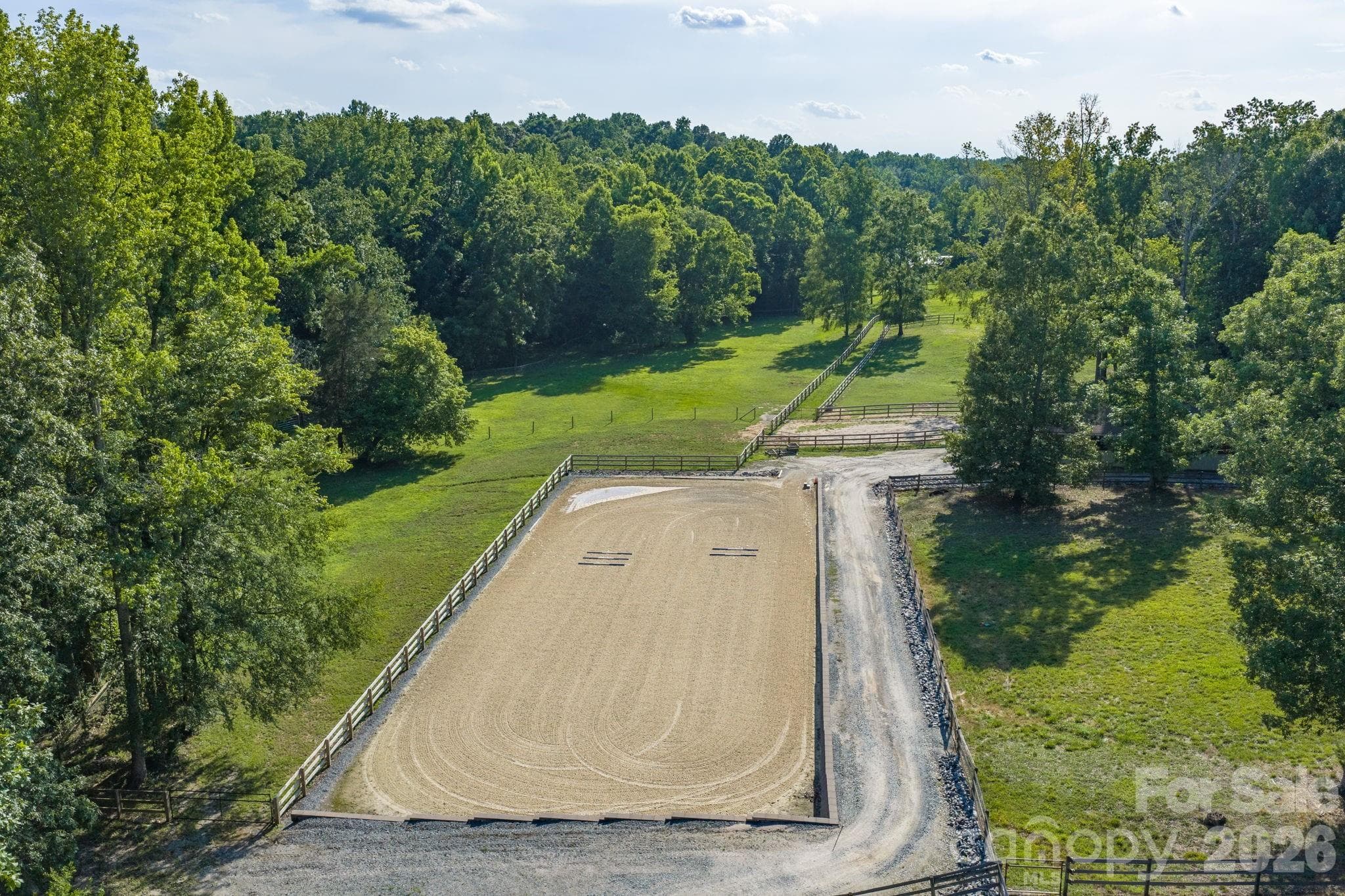 Professionally built 66' x 166' sand arena with drainage system - 8528 Waxhaw Creek Road, Waxhaw