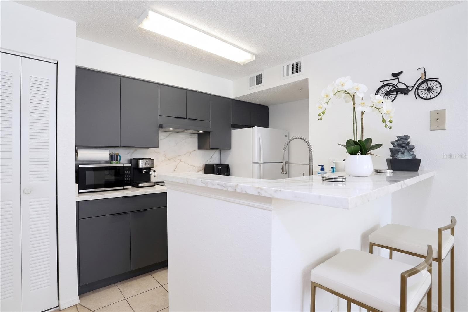 Ai enhanced - 2209 ANTIGUA PL #828, KISSIMMEE
