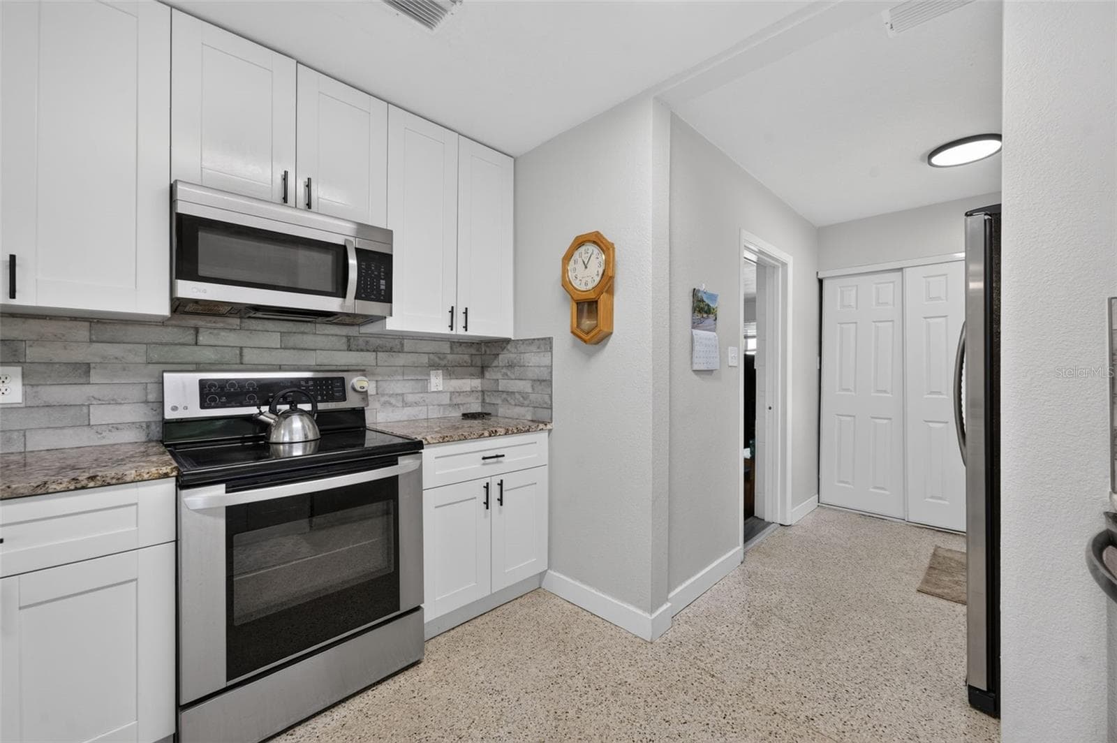 Kitchen Stainless Range and microwave - 619 MARSHALL ST, ALTAMONTE SPRINGS