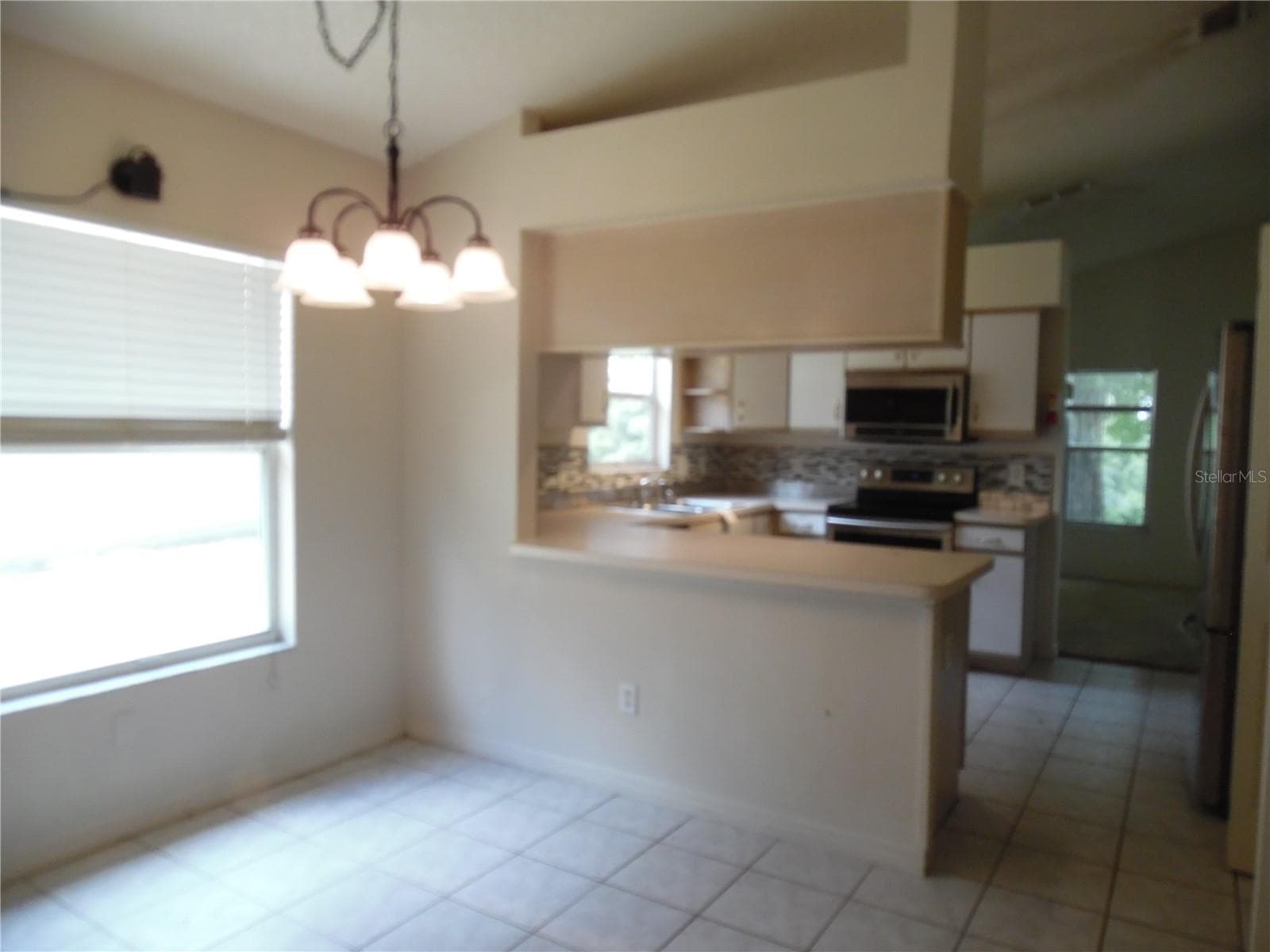 Dinette area off the kitchen - 24947 CRANES ROOST CIR, LEESBURG
