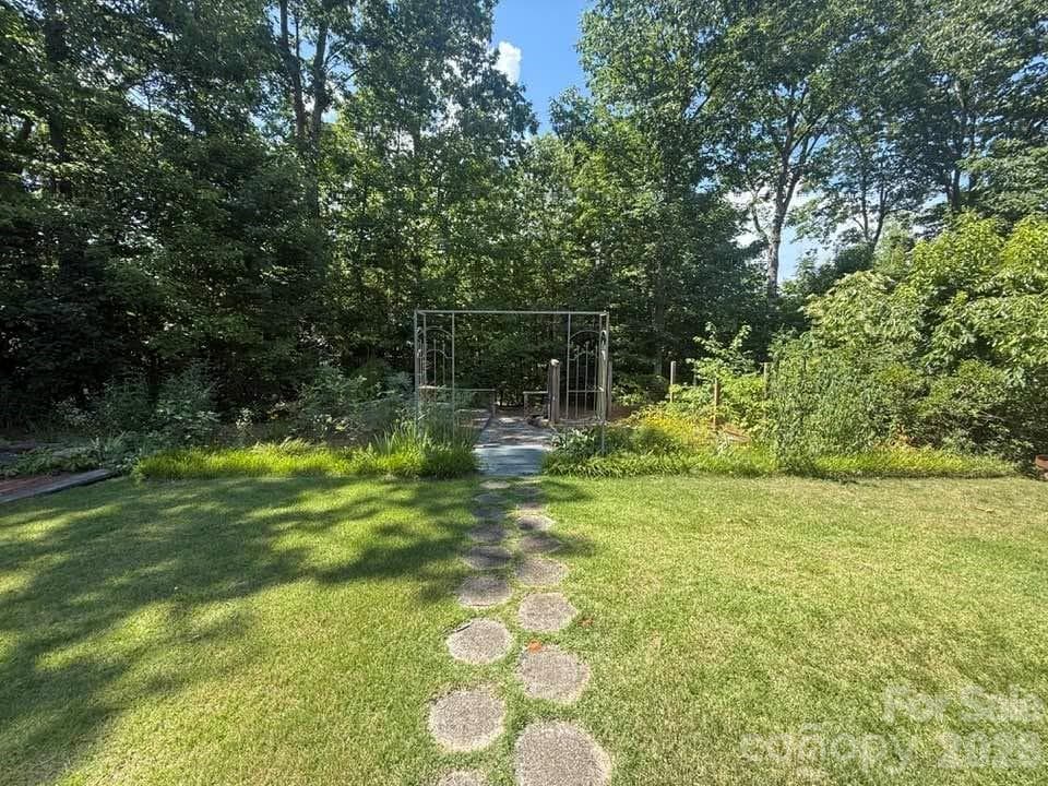 Walk-way from rear patio to gardens - 160 Caledonia Road, Landrum