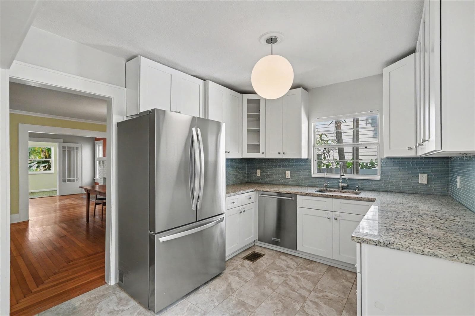 Thoughtfully designed storage and counter space make this bright kitchen as practical as it is welcoming. - 857 21ST AVE N, ST PETERSBURG