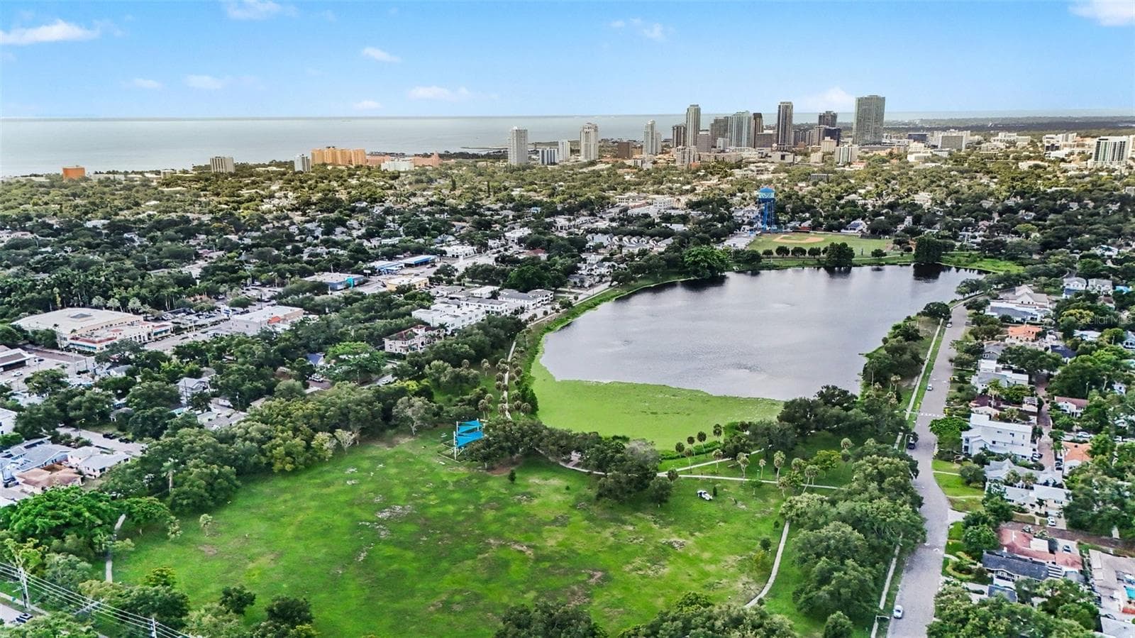 Crescent Lake Park’s scenic waterfront, walking paths, and expansive green space are close by, with downtown St. Petersburg rising in the distance. - 857 21ST AVE N, ST PETERSBURG