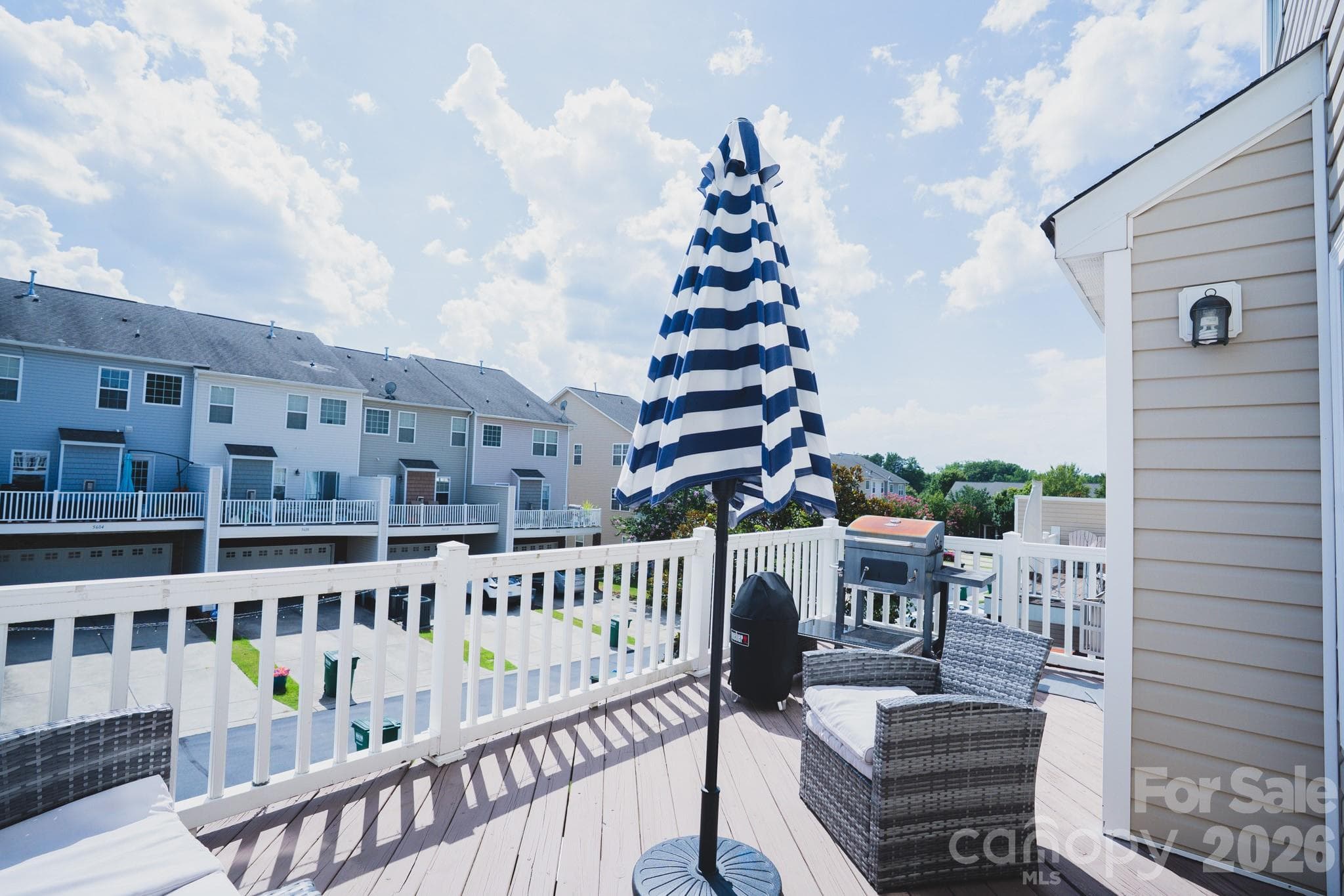 Off of the kitchen is your deck - Charlotte