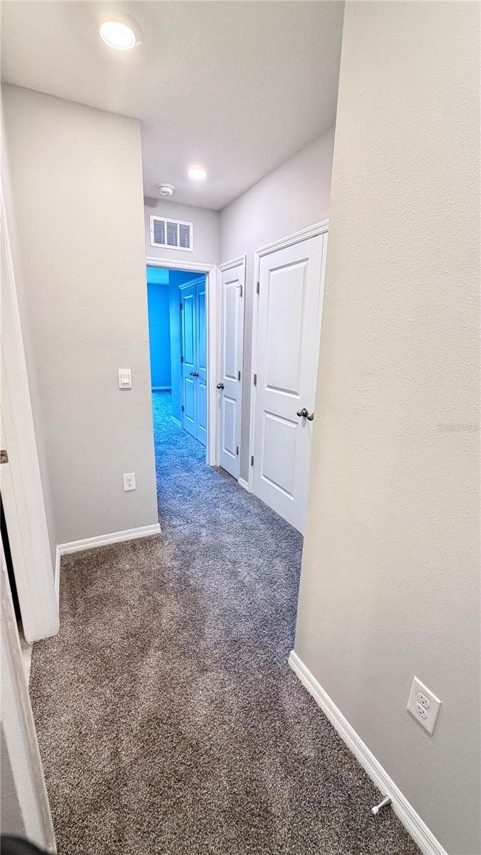 View from upstairs hallway - 5254 DRAGONFLY DR, WILDWOOD