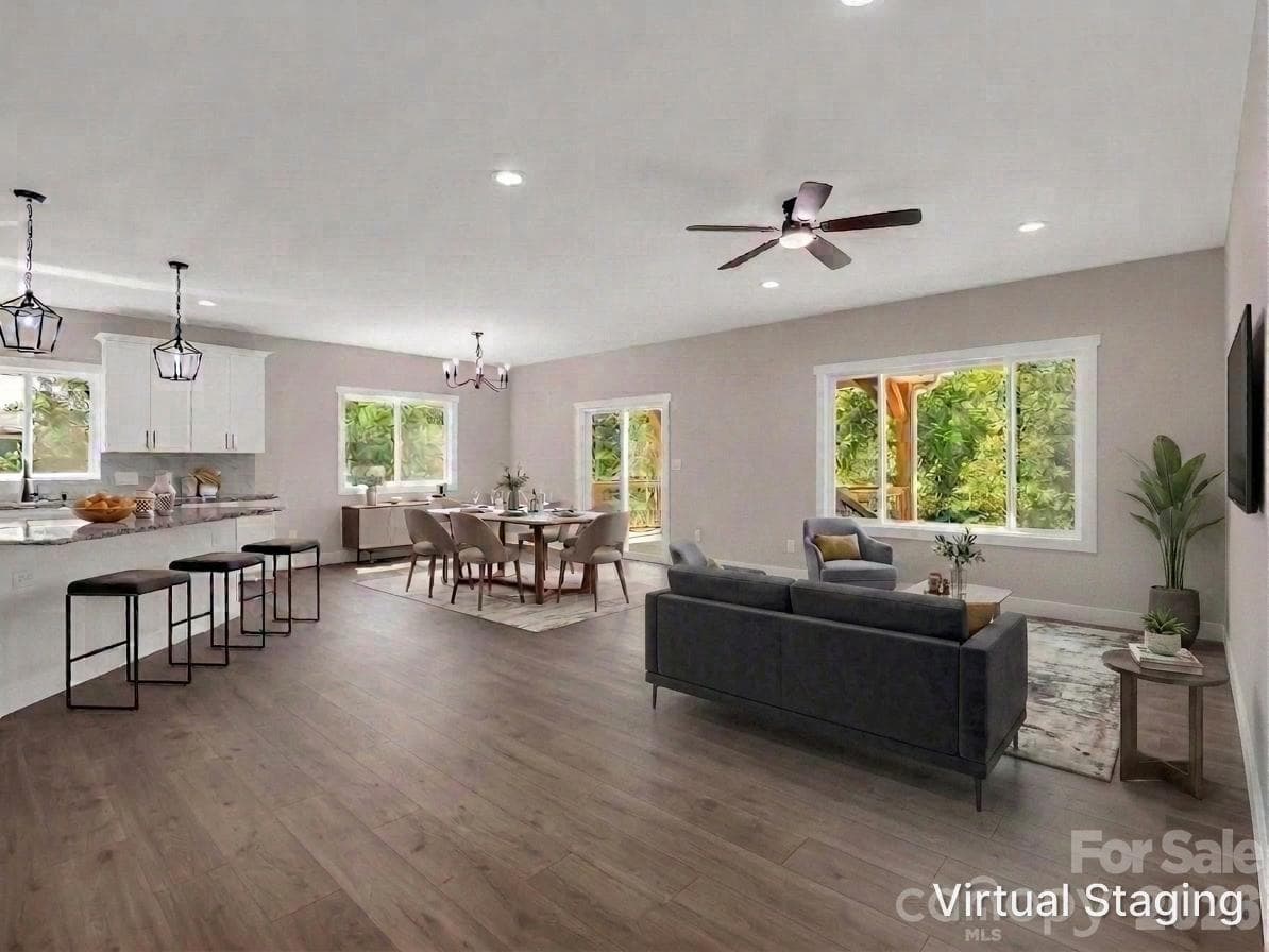 Open floor plan (kitchen, dining and living) hardwood floors, granite counters, sliders to covered screened porch Virtually Staged to allow buyers to envision the space - Hendersonville