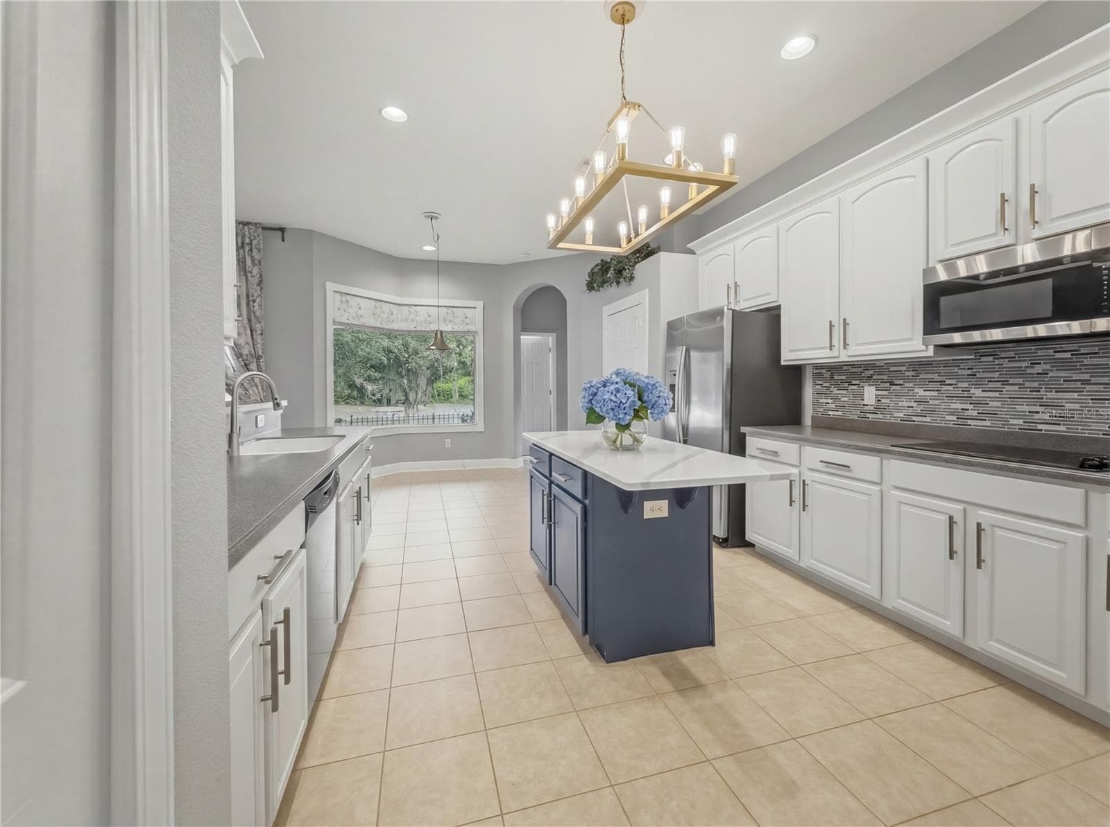 Kitchen View from Dining Room - 11530 Oyster Bay Circle, New Port Richey, FL 34654 - 11530 OYSTER BAY CIR, NEW PORT RICHEY