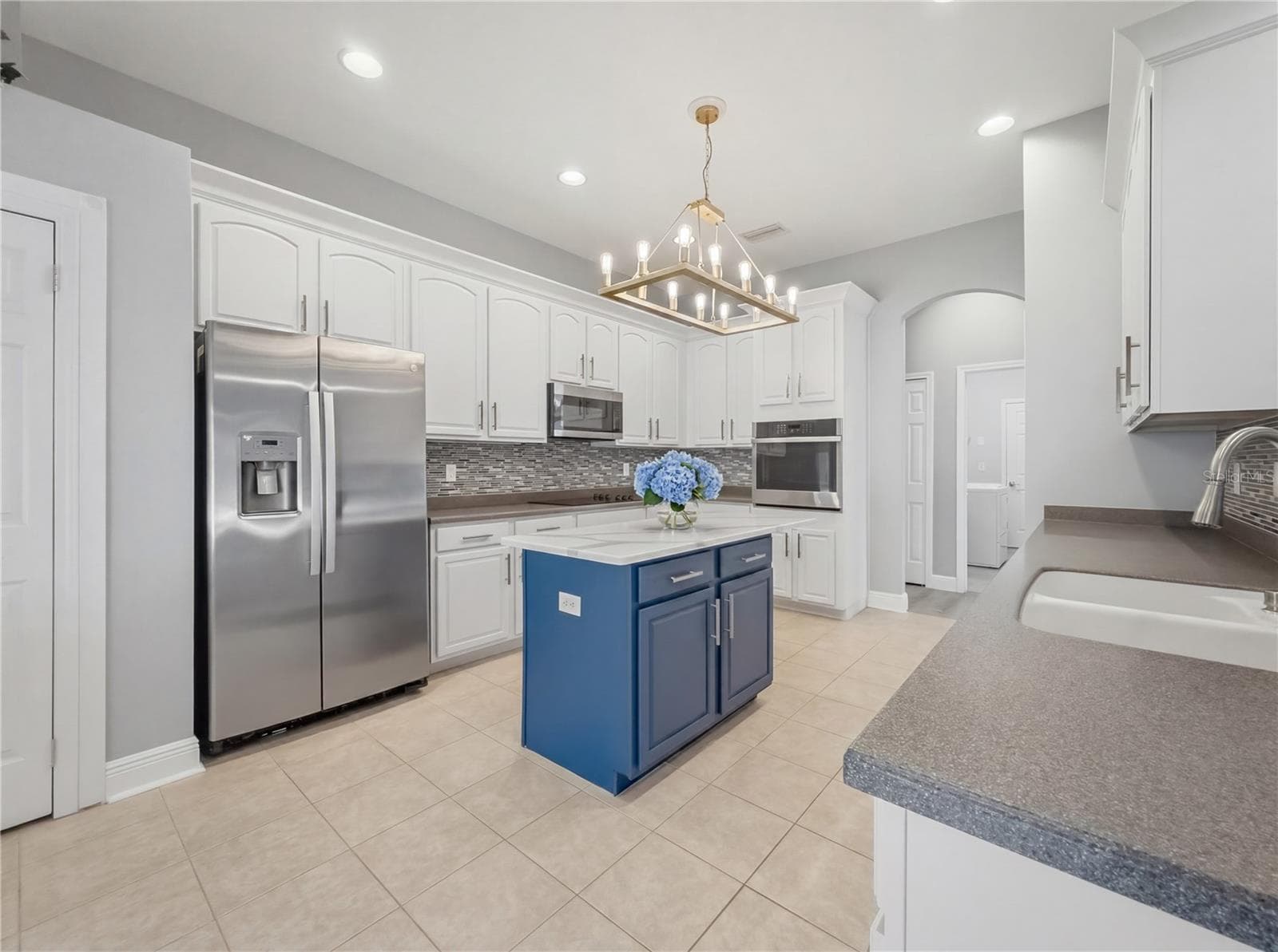 Kitchen view from Family Room - 11530 Oyster Bay Circle, New Port Richey, FL 34654 - 11530 OYSTER BAY CIR, NEW PORT RICHEY