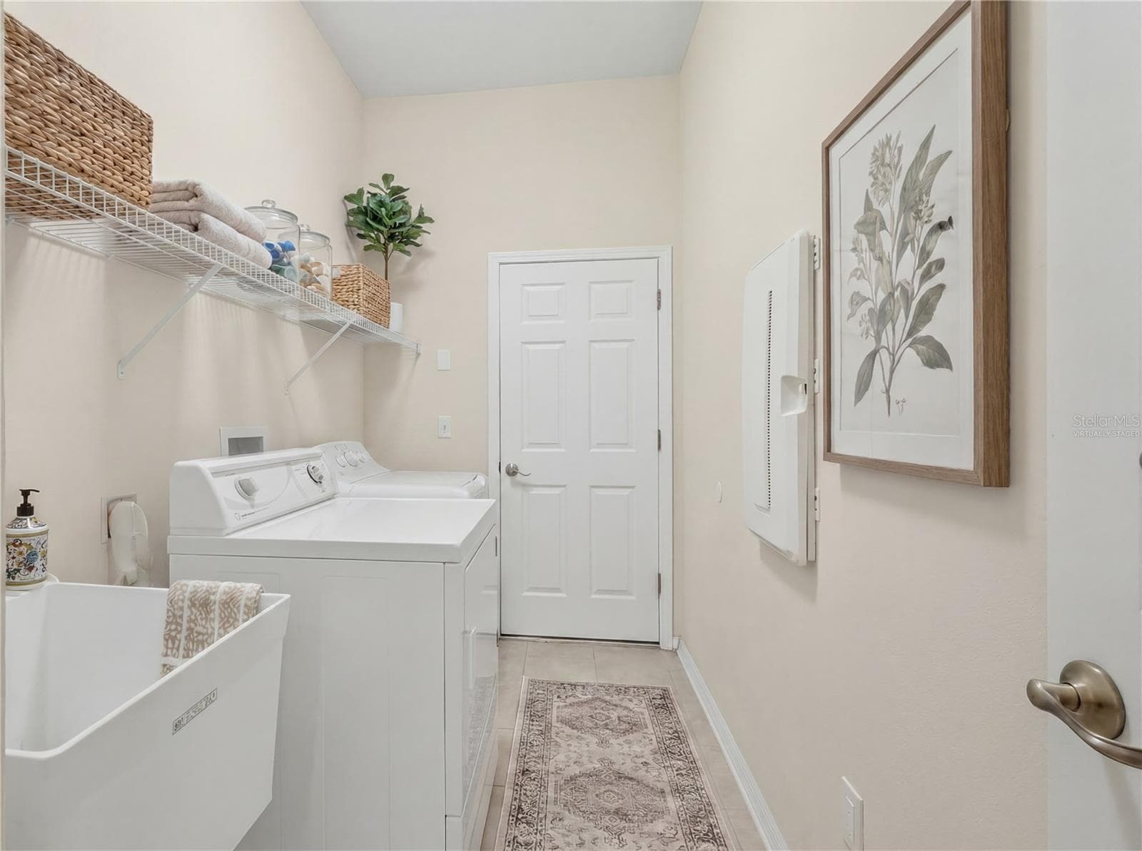 Virtually Staged Laundry Room - 11530 Oyster Bay Circle, New Port Richey, FL 34654 - 11530 OYSTER BAY CIR, NEW PORT RICHEY