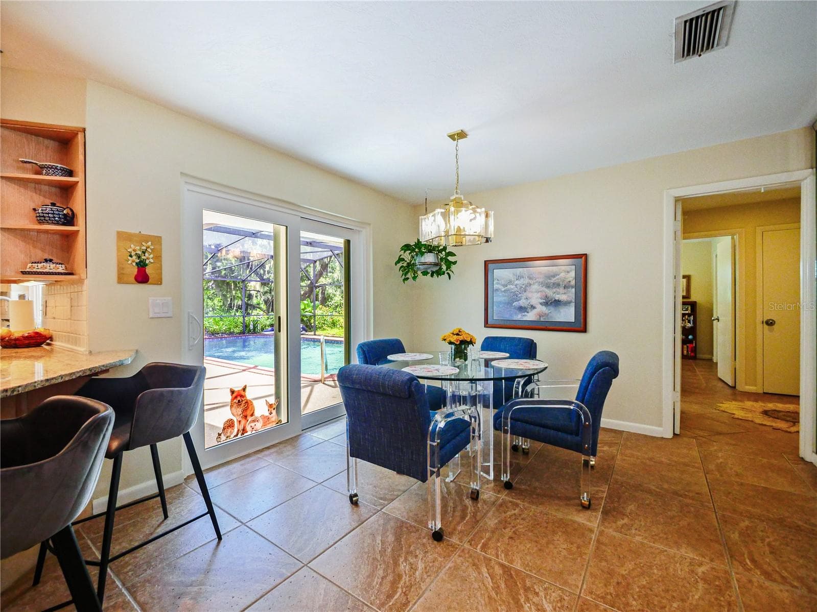 DINETTE / SLIDING DOOR TO POOL - 5701 CROSS FOX LN, OVIEDO