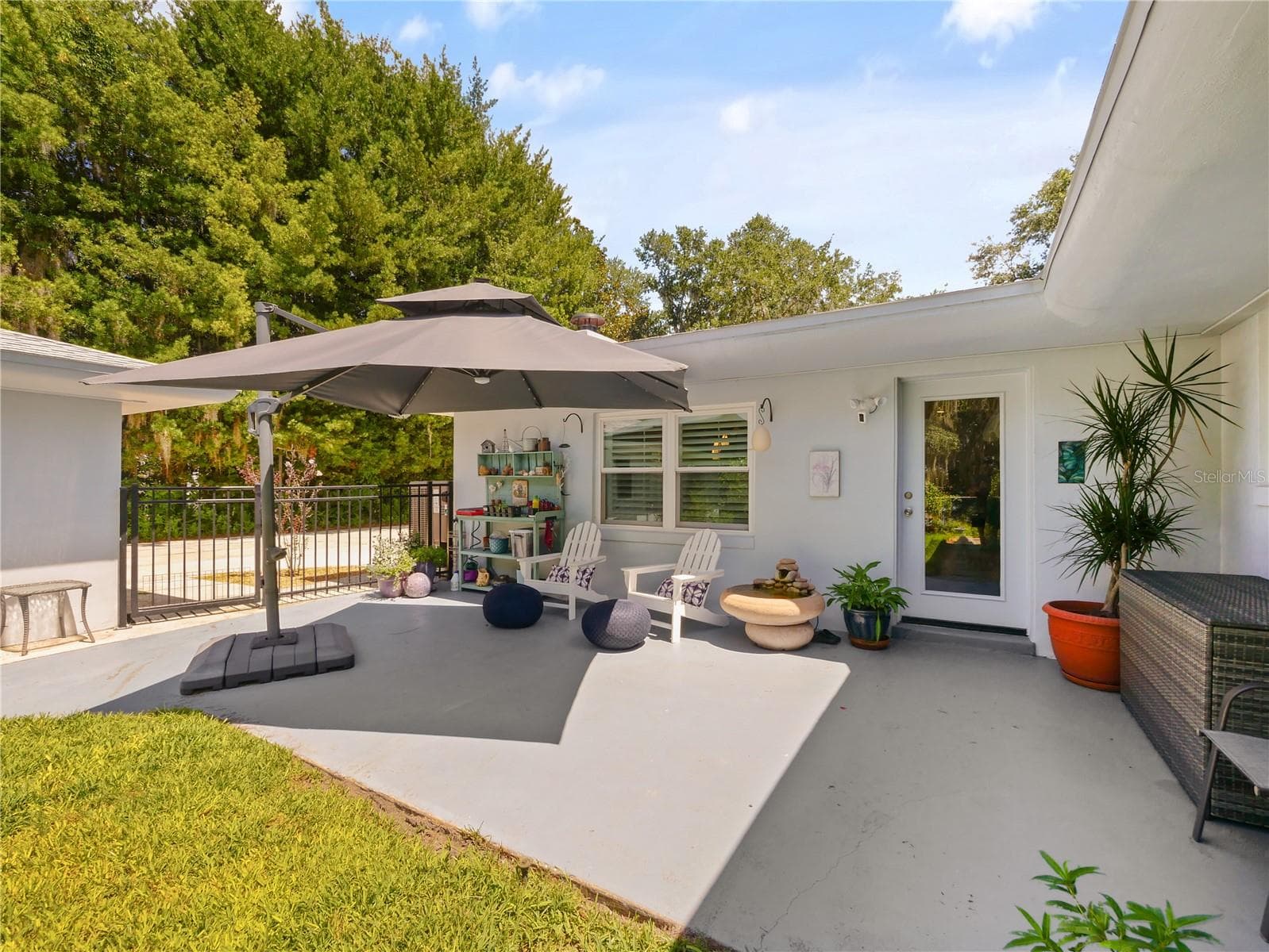 CEMENT PATIO OFF GAME ROOM - 5701 CROSS FOX LN, OVIEDO