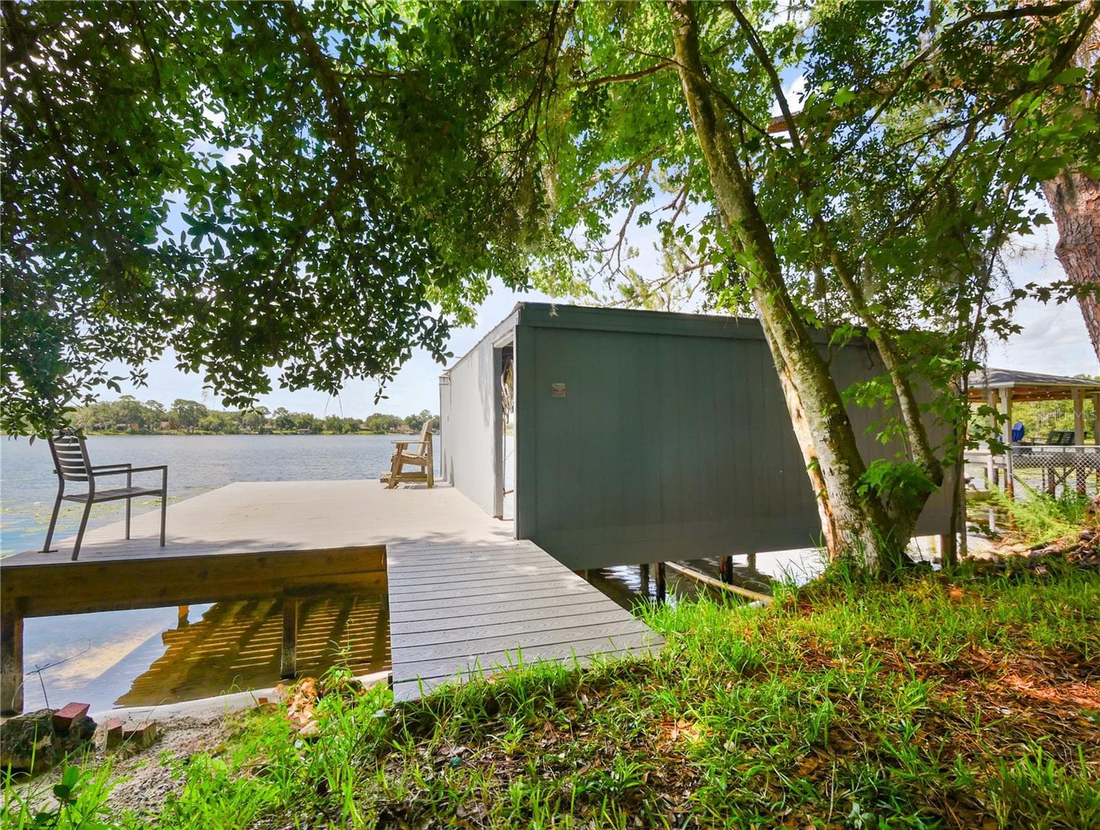 SECOND DOCK WITH LARGE DECK AND DOUBLE BOATHOUSE - 5701 CROSS FOX LN, OVIEDO