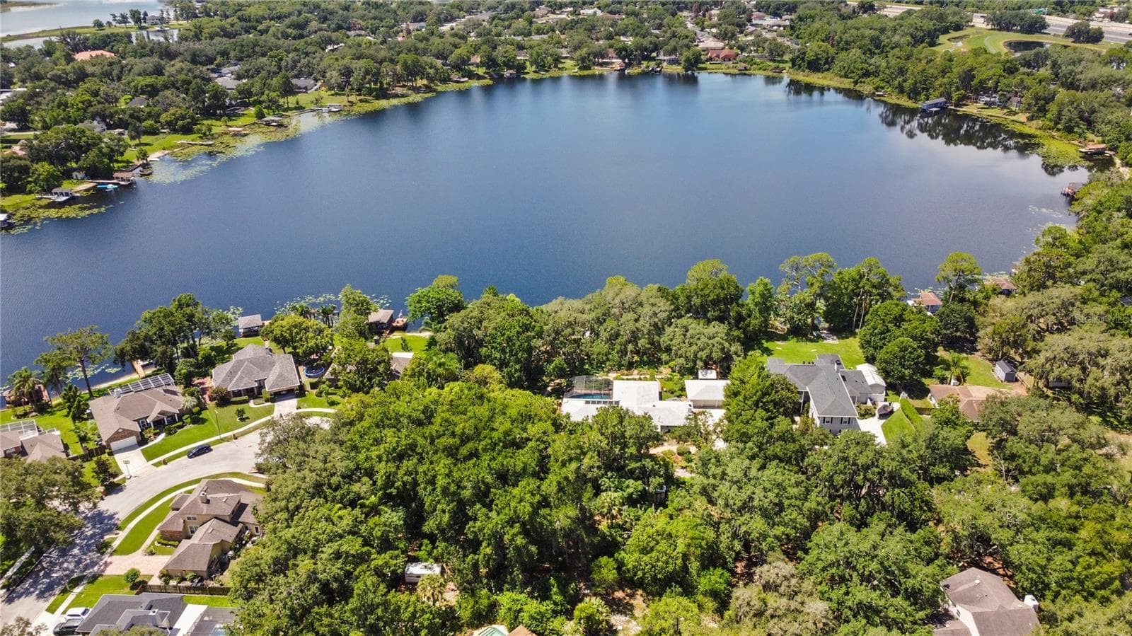SKY VIEW OF DEEP LAKE OVIEDO WITH GREAT WATER QUALITY - 5701 CROSS FOX LN, OVIEDO