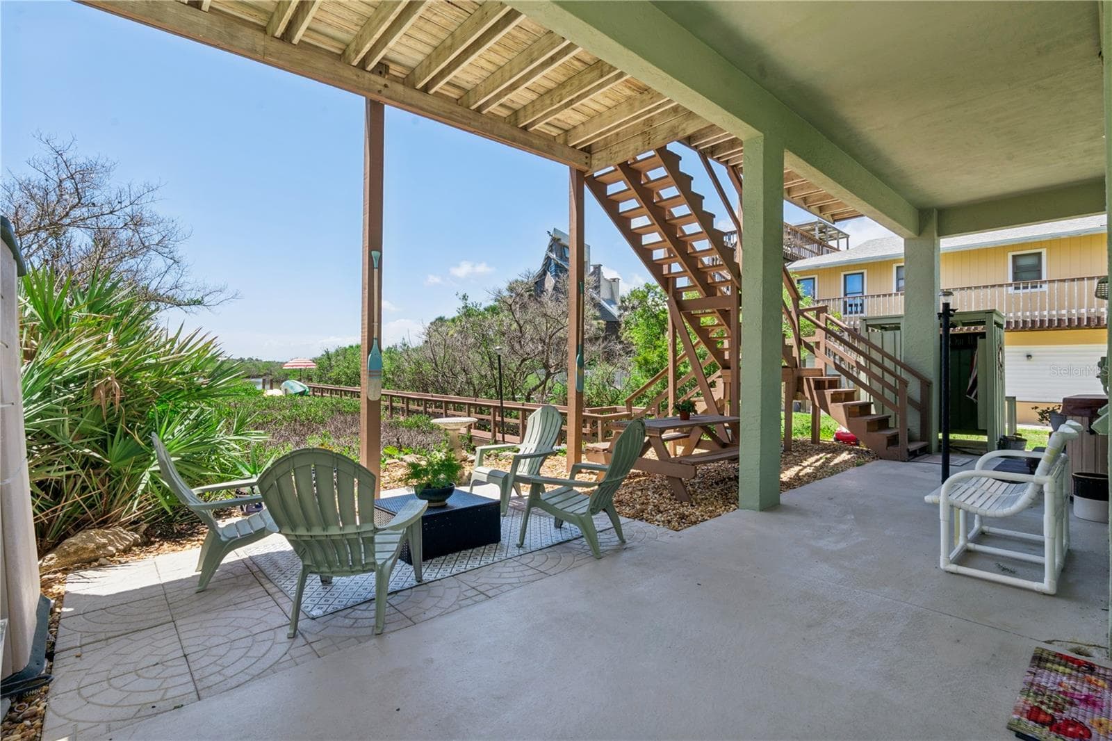Quiet gathering space and grill area with outdoor shower. - 884 CATFISH AVE, NEW SMYRNA BEACH