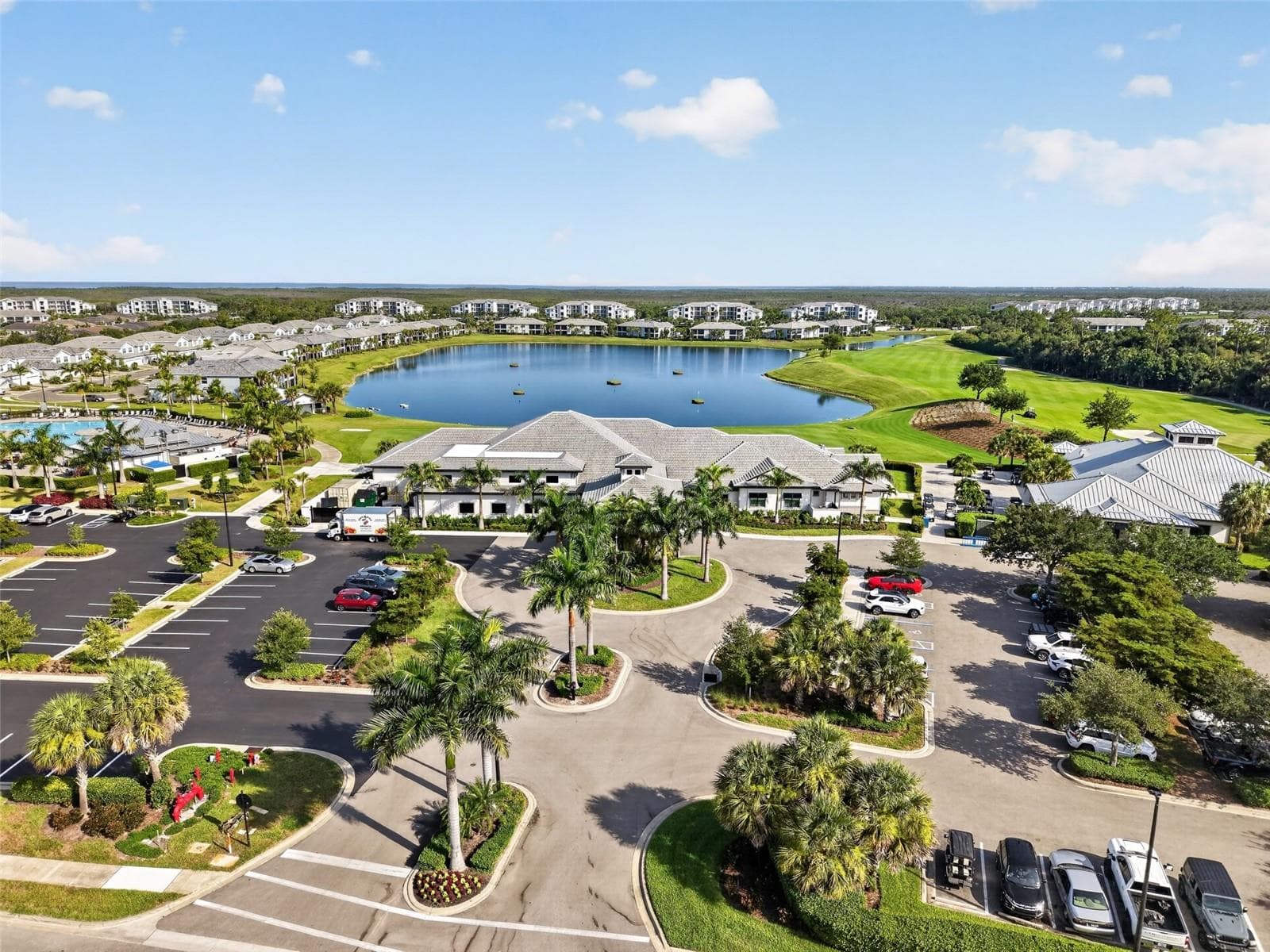 Club House and right behind it is the driving range - 14648 SYCAMORE CT #3022, PUNTA GORDA