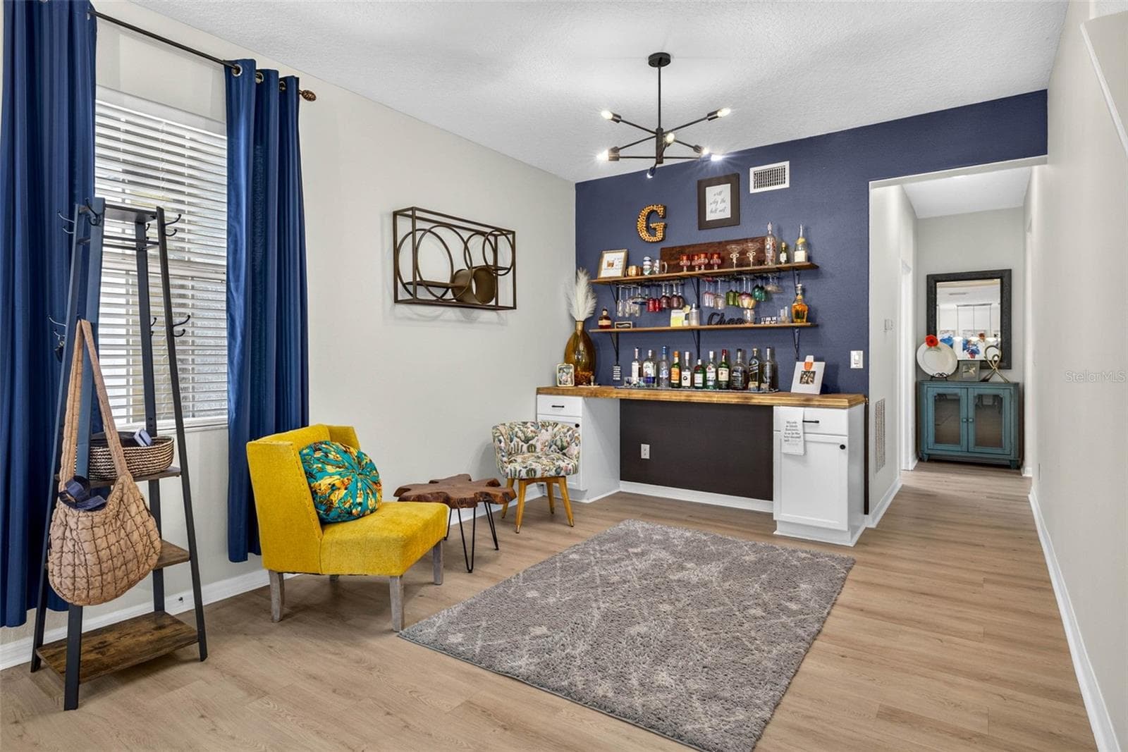 Great space for relaxing separate from the living room. - 7360 BRIDGEVIEW DR, WESLEY CHAPEL