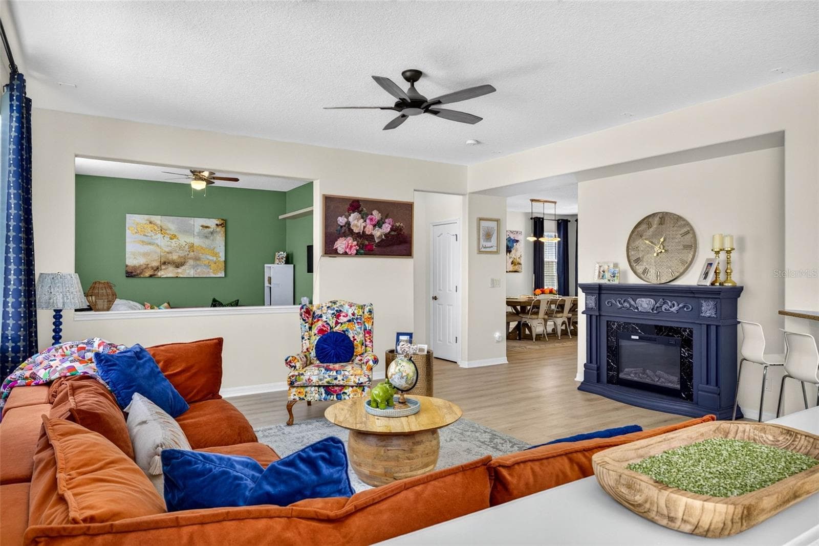 Living room connects to an office space on first floor - 7360 BRIDGEVIEW DR, WESLEY CHAPEL