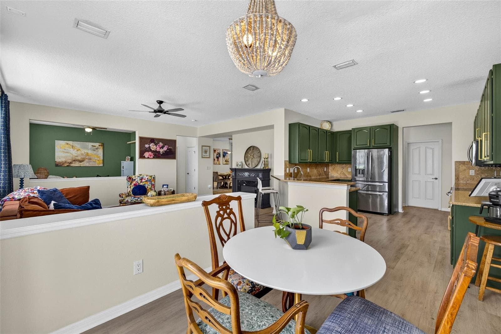 Dine informally here or at the dining room - 7360 BRIDGEVIEW DR, WESLEY CHAPEL
