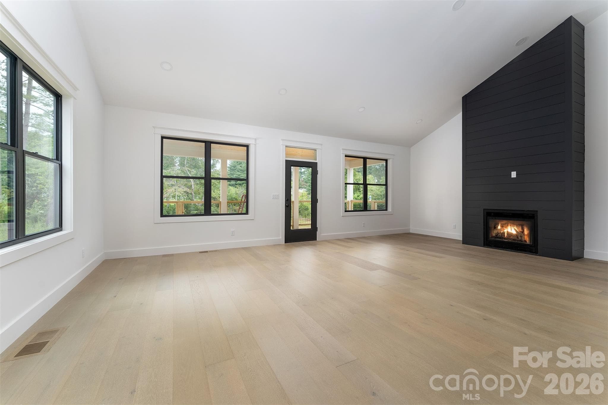 large living room/dining room with beautiful gas fireplace - 808 Maybank Drive, Hendersonville