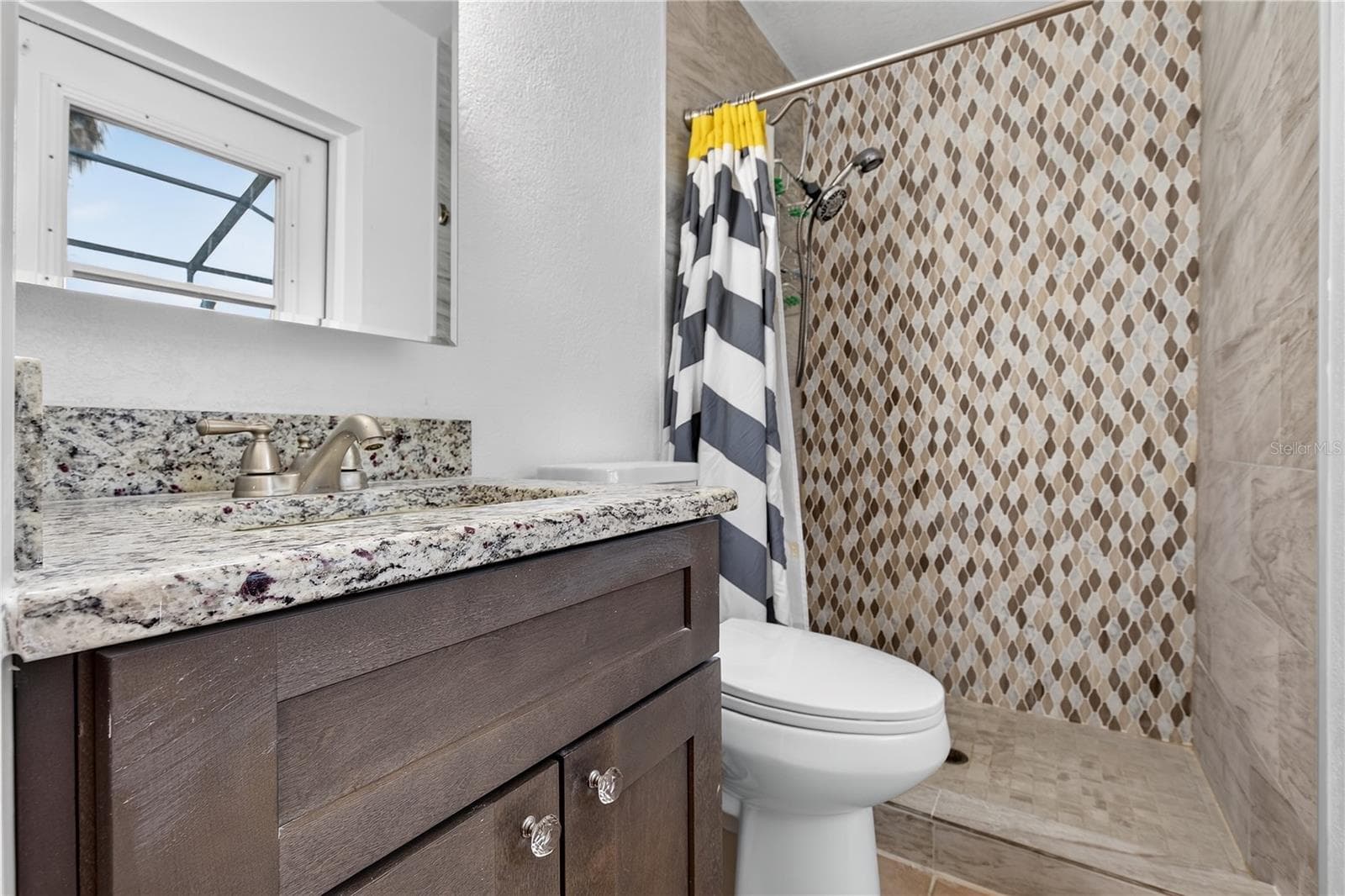 Single Family Residence at 5010 STOLLS AVE, TAMPA, photo 5 of 47