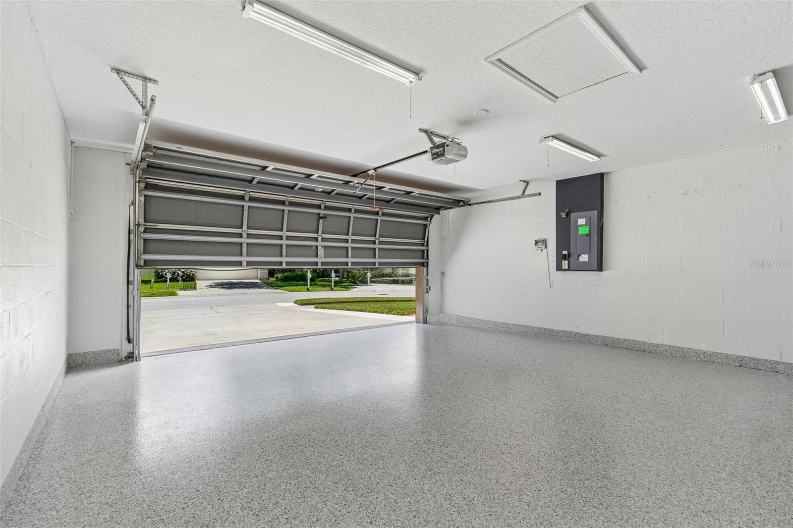 2 car garage - 32323 FISH HOOK LOOP, WESLEY CHAPEL